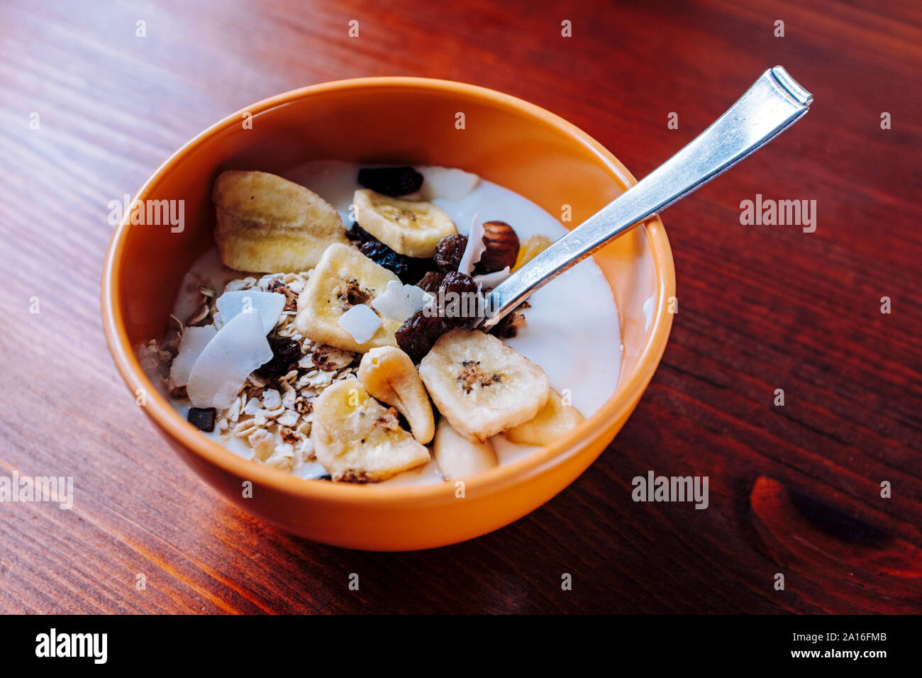 Healthy snacks Cereals with dried fruits and yoghurt Stock Photo Alamy