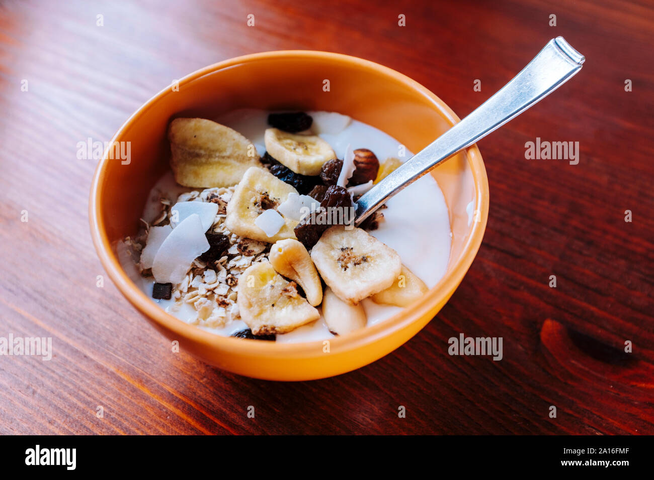 Healthy snacks Cereals with dried fruits and yoghurt Stock Photo Alamy