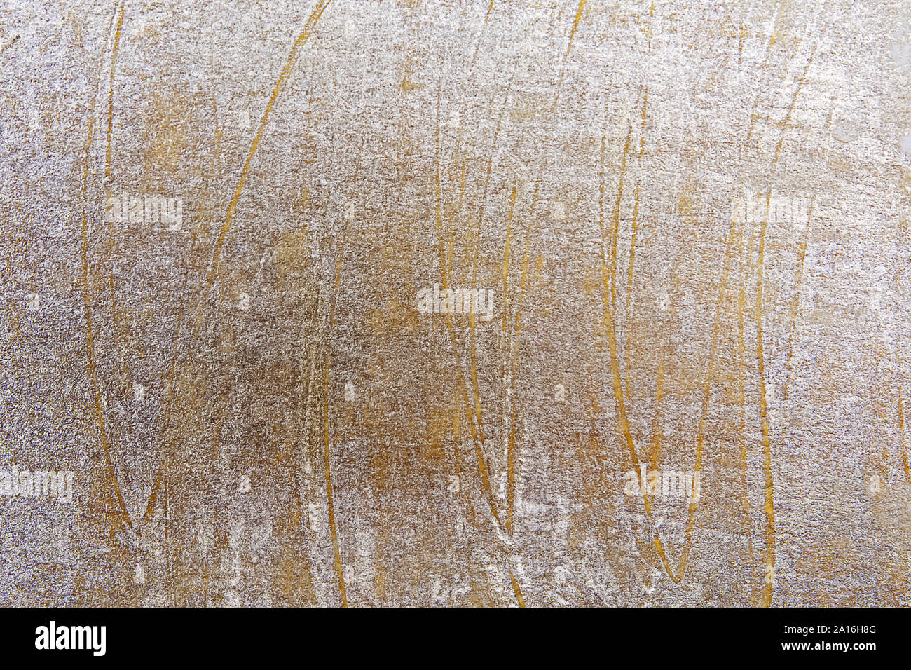 Rough golden painted surface background. Stock Photo