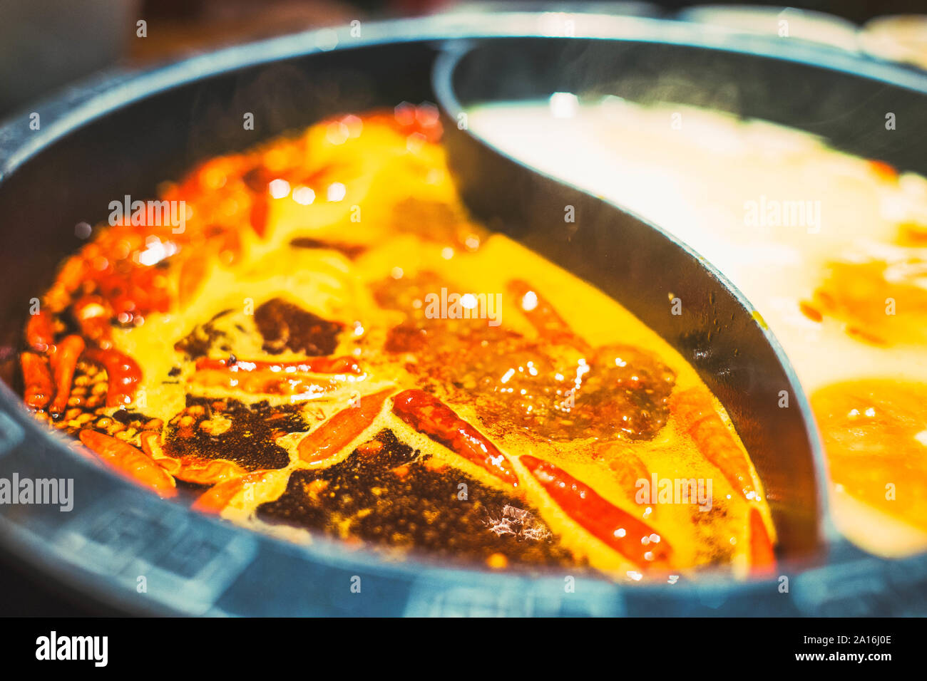 Chinese hot pot, with boiling mala spicy soup Stock Photo Alamy