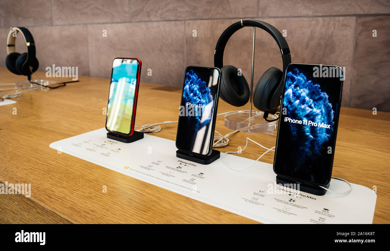 Paris, France - Sep 20, 2019: The new iPhone 11, 11 Pro and Pro Max range displayed in Apple Store next to Beats by Dr Dre Headphones as the smartphone by Apple Computers goes on sale Stock Photo