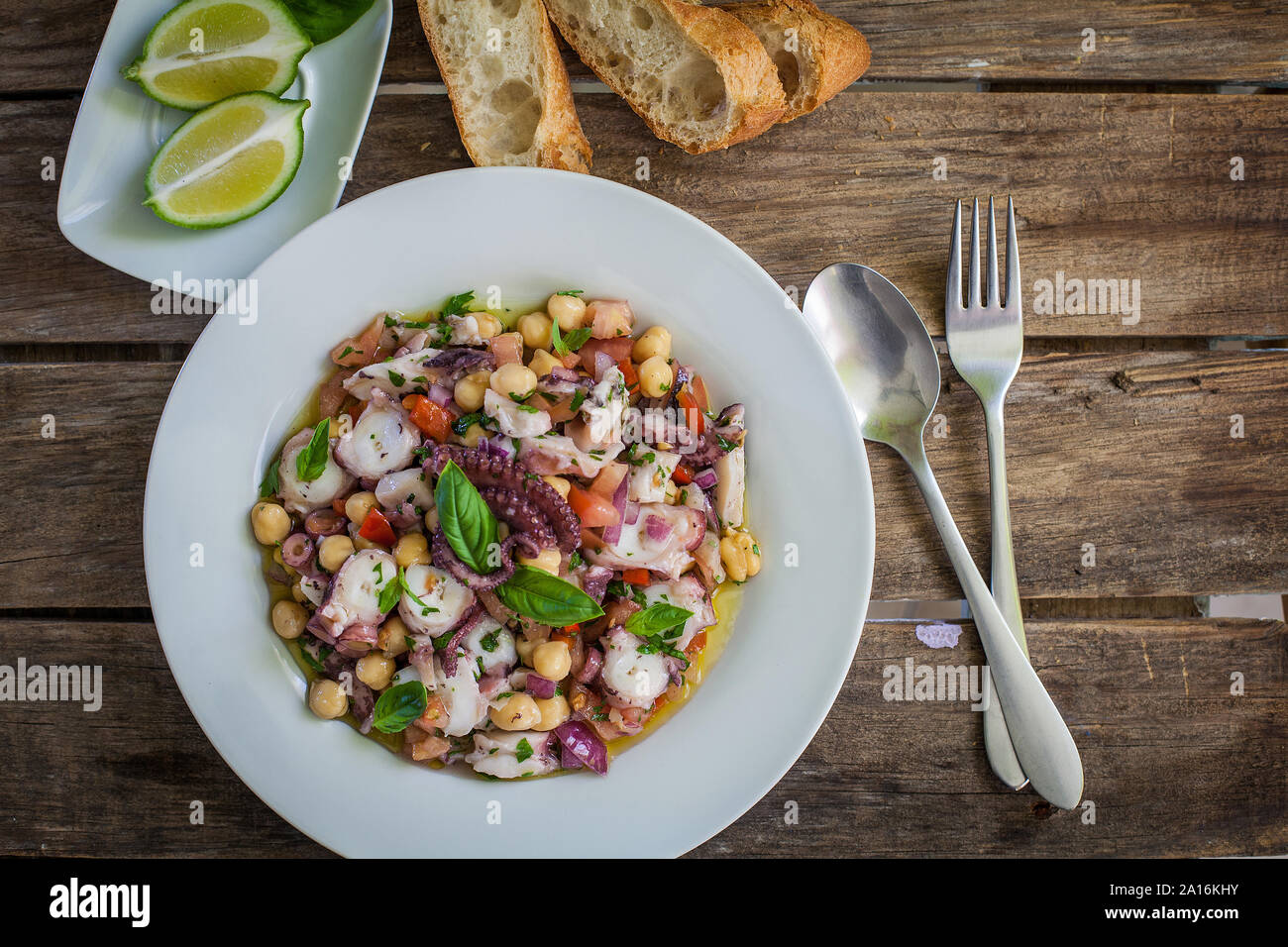 healthy octopus and chickpeas salad with veggies Stock Photo