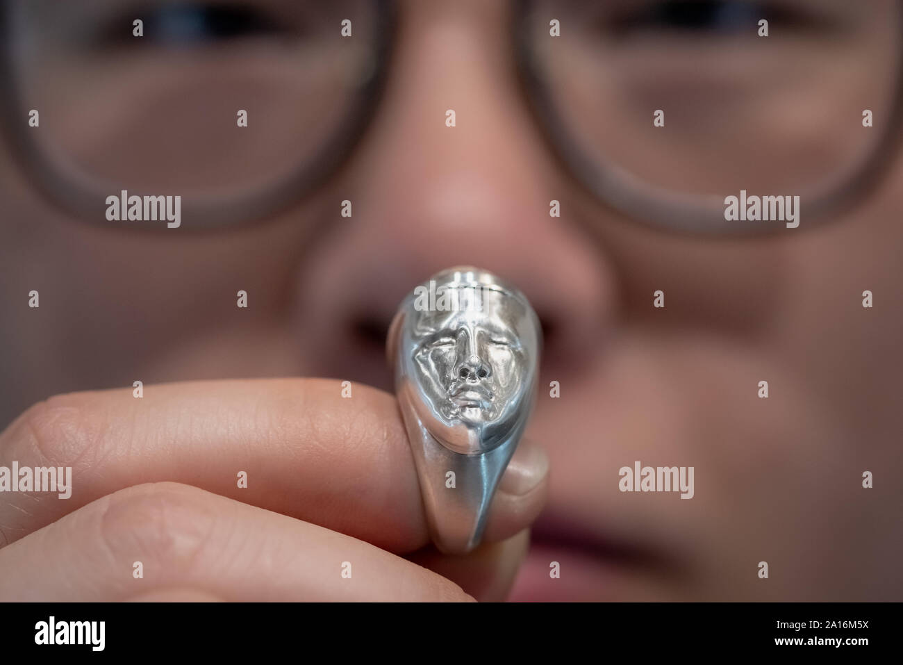 London, UK. 24th Sept, 2019. Face Ring designed by Caiyang Yin on display at Goldsmiths' Fair. Held annually at Goldsmiths' Hall, the fair is the UK's best selling event for designer-led contemporary jewellery and silverware. Credit: Guy Corbishley/Alamy Live News Stock Photo