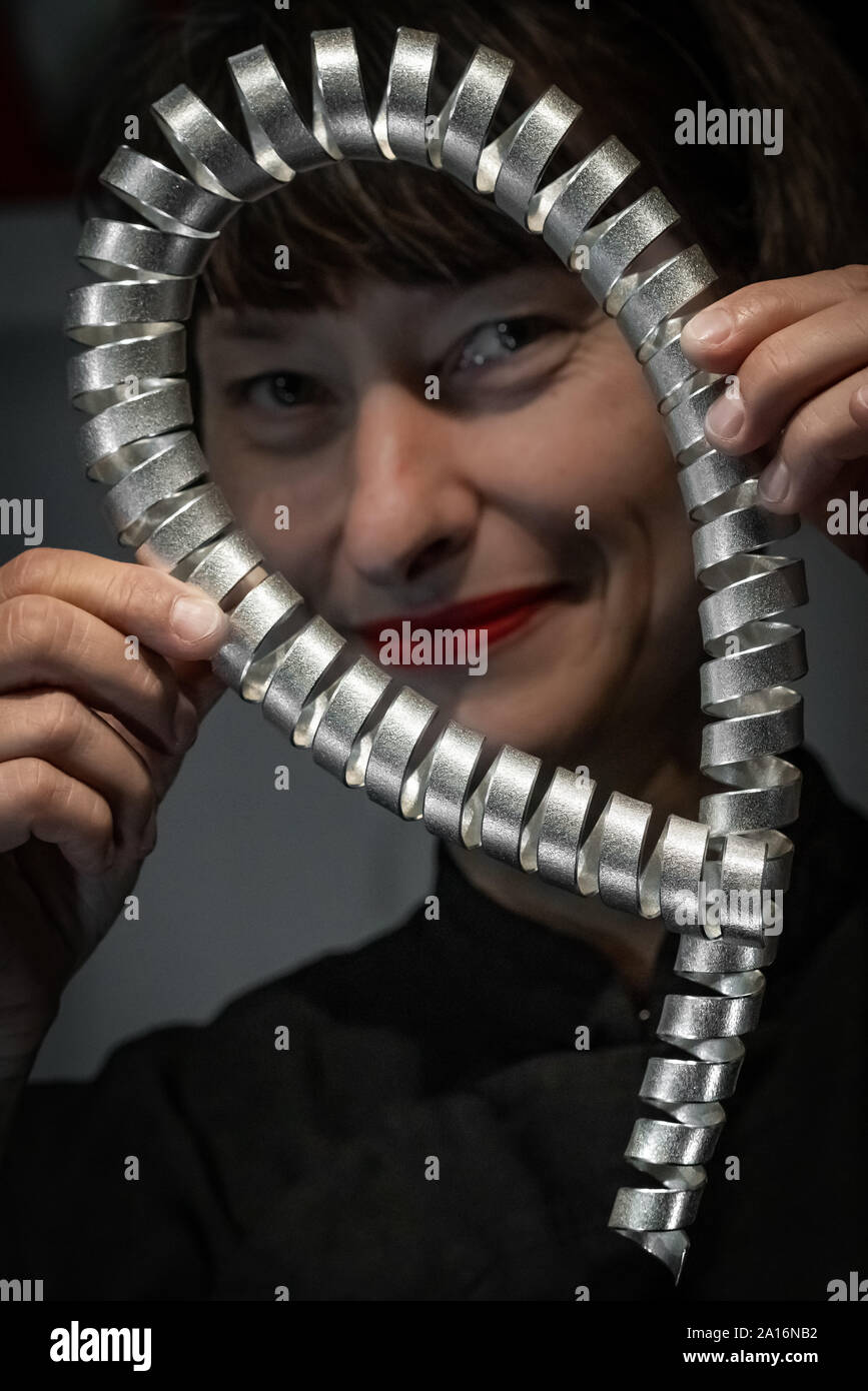 London, UK. 24th Sept, 2019. Spiral Neck Sculpture by Ute Decker on display at Goldsmiths' Fair. Held annually at Goldsmiths' Hall, the fair is the UK's best selling event for designer-led contemporary jewellery and silverware. Credit: Guy Corbishley/Alamy Live News Stock Photo