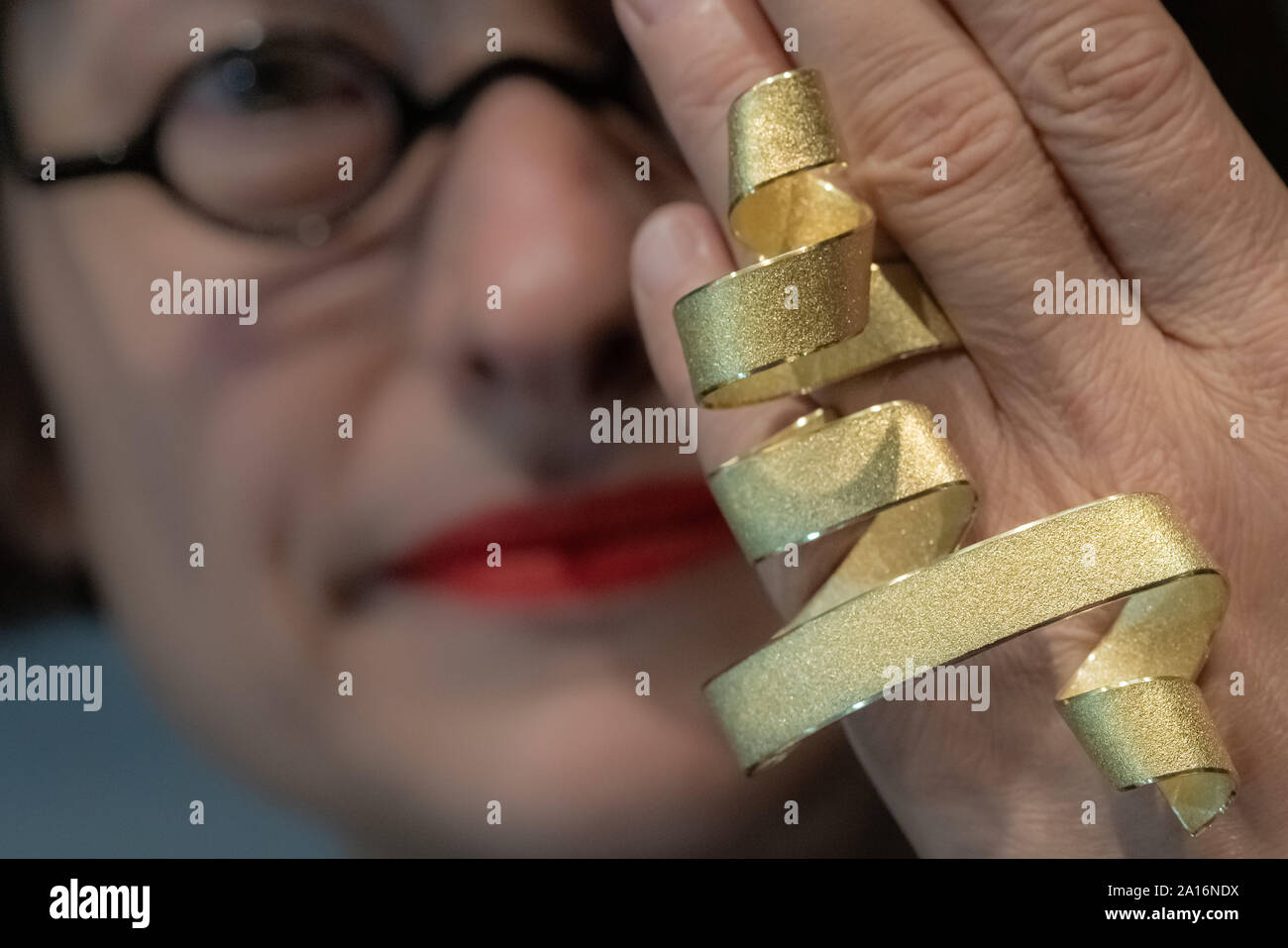 London, UK. 24th Sept, 2019. Calligraphy Hand Sculpture in 18ct fairtrade gold by Ute Decker on display at Goldsmiths' Fair. Held annually at Goldsmiths' Hall, the fair is the UK's best selling event for designer-led contemporary jewellery and silverware. Credit: Guy Corbishley/Alamy Live News Stock Photo