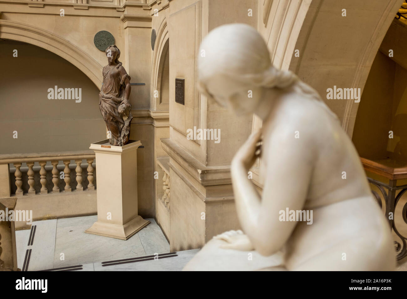 Sculptures in the staircase, Bristol Museum & Art Gallery, UK Stock Photo