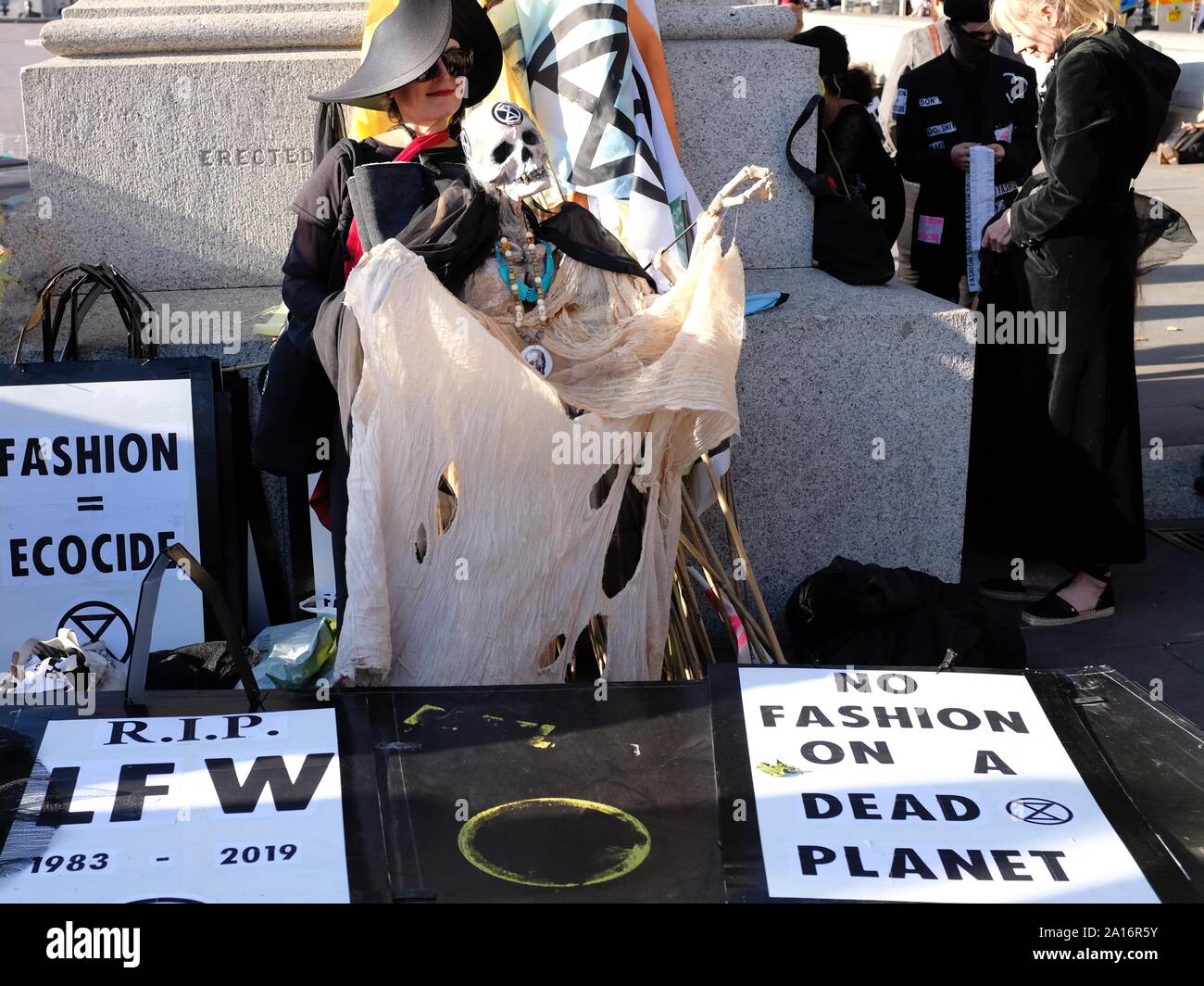 Environmental activists Extinction Rebellion at staged funeral protest against London Fashion Week in Trafalgar Square on September 17 2019 Stock Photo