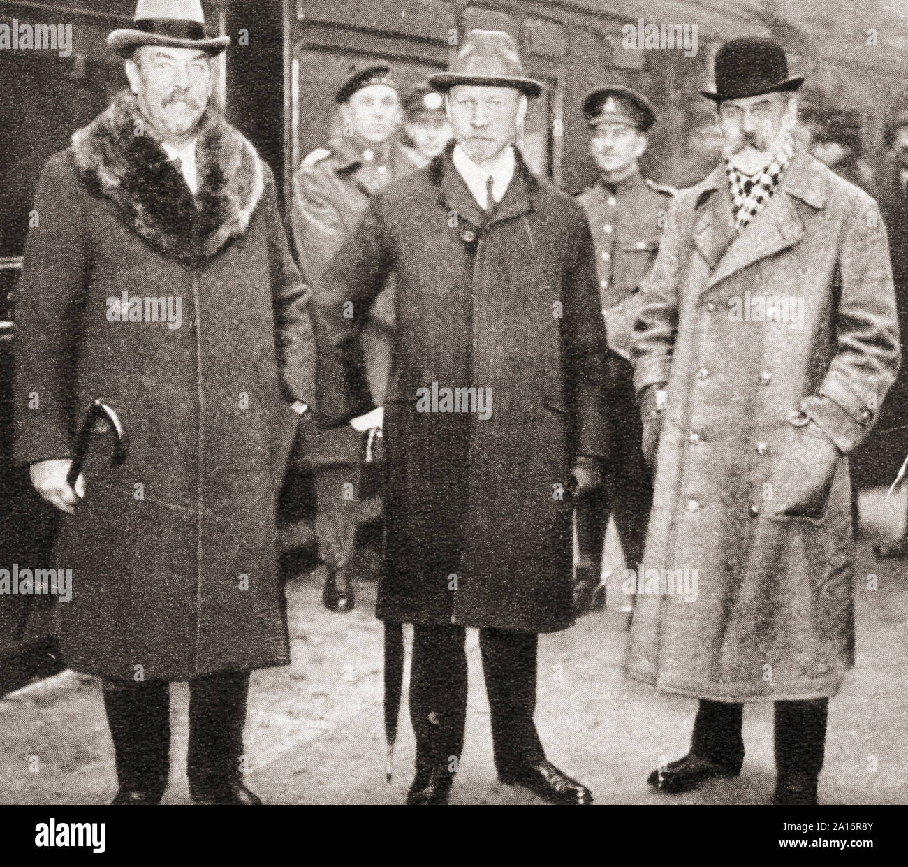 General Botha, left, General Smuts, centre and Sir Joseph Cook at the Paris Peace Conference, 1919.  Louis Botha, 1862 – 1919.  South African politician and first Prime Minister of the Union of South Africa.  Field Marshal Jan Christiaan Smuts, 1870 –  1950. South African statesman, military leader, and philosopher.  Sir Joseph Cook, 1860 – 1947.  Australian politician and sixth Prime Minister of Australia.  From The Pageant of the Century, published 1934. Stock Photo