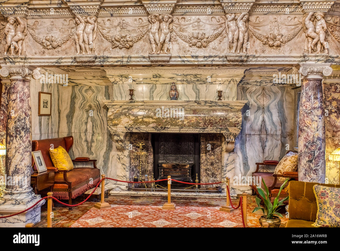 Large marble fireplace at Cragside House, Northumberland, UK Stock Photo