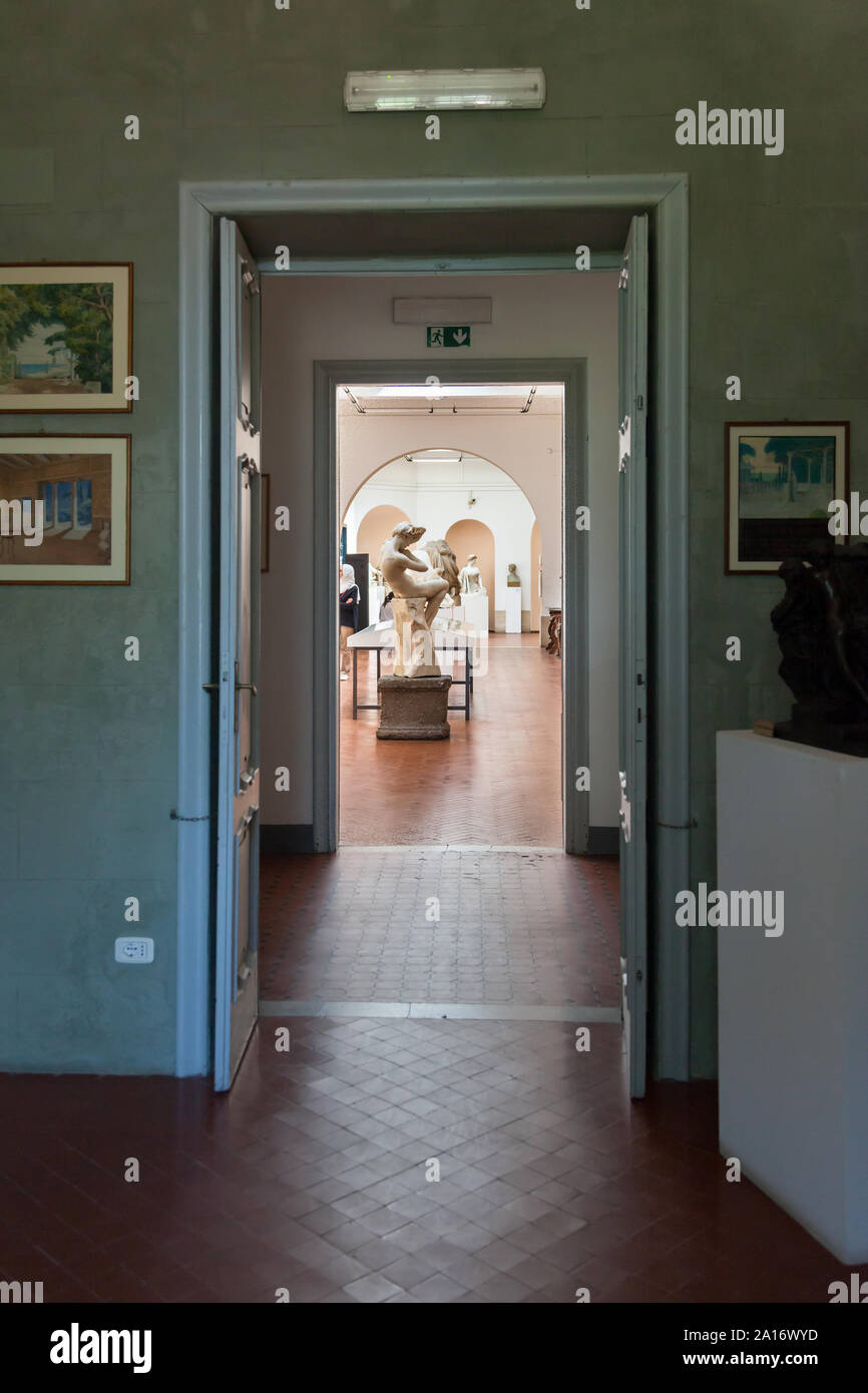 Sculpture 'Pudore' seen from adjacent room at Museo Pietro Canonica a Villa Borghese, Rome, Italy Stock Photo