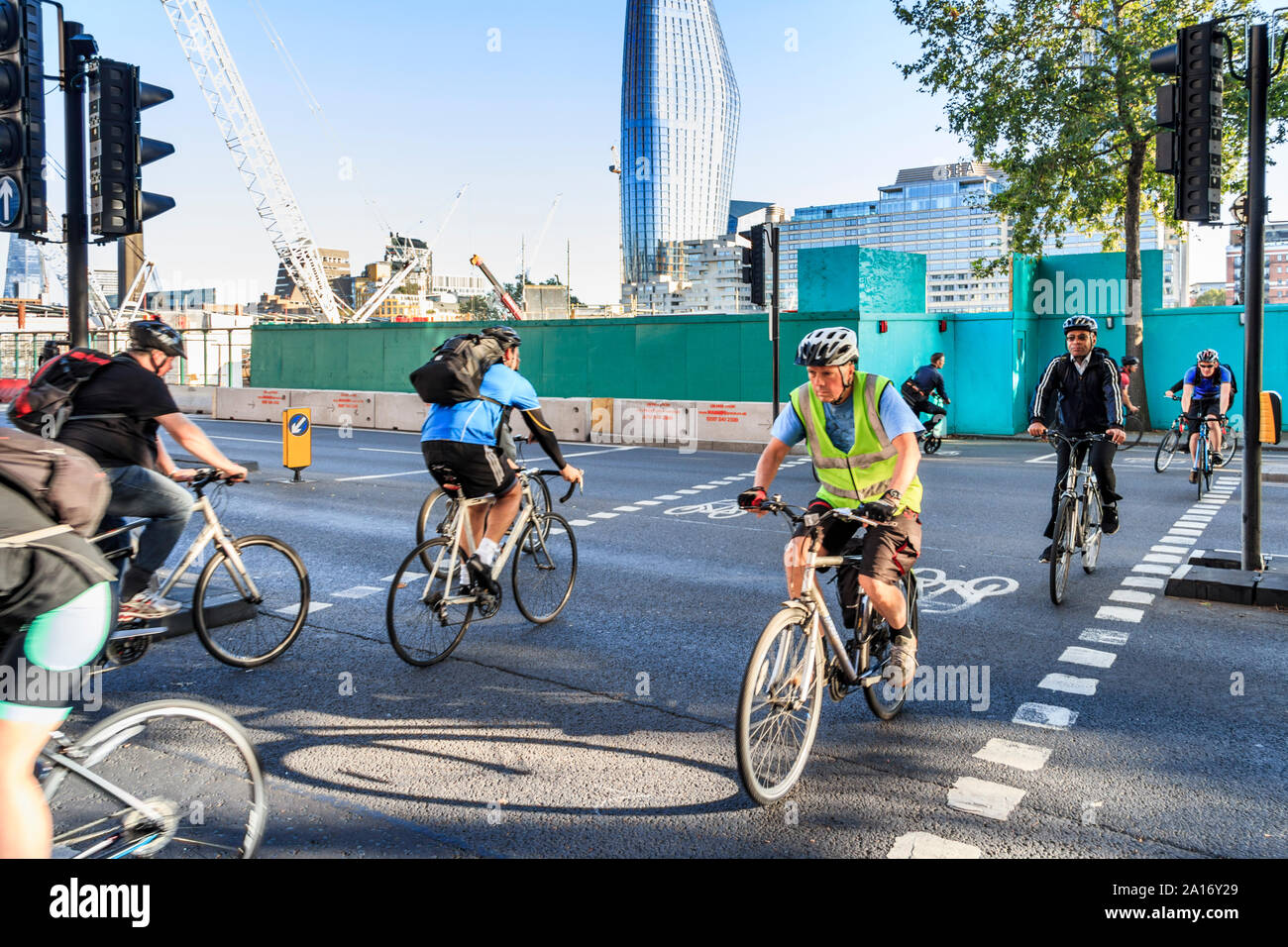 Cyclists on the cycle highway on the Victoria Embankment, London, UK Stock Photo