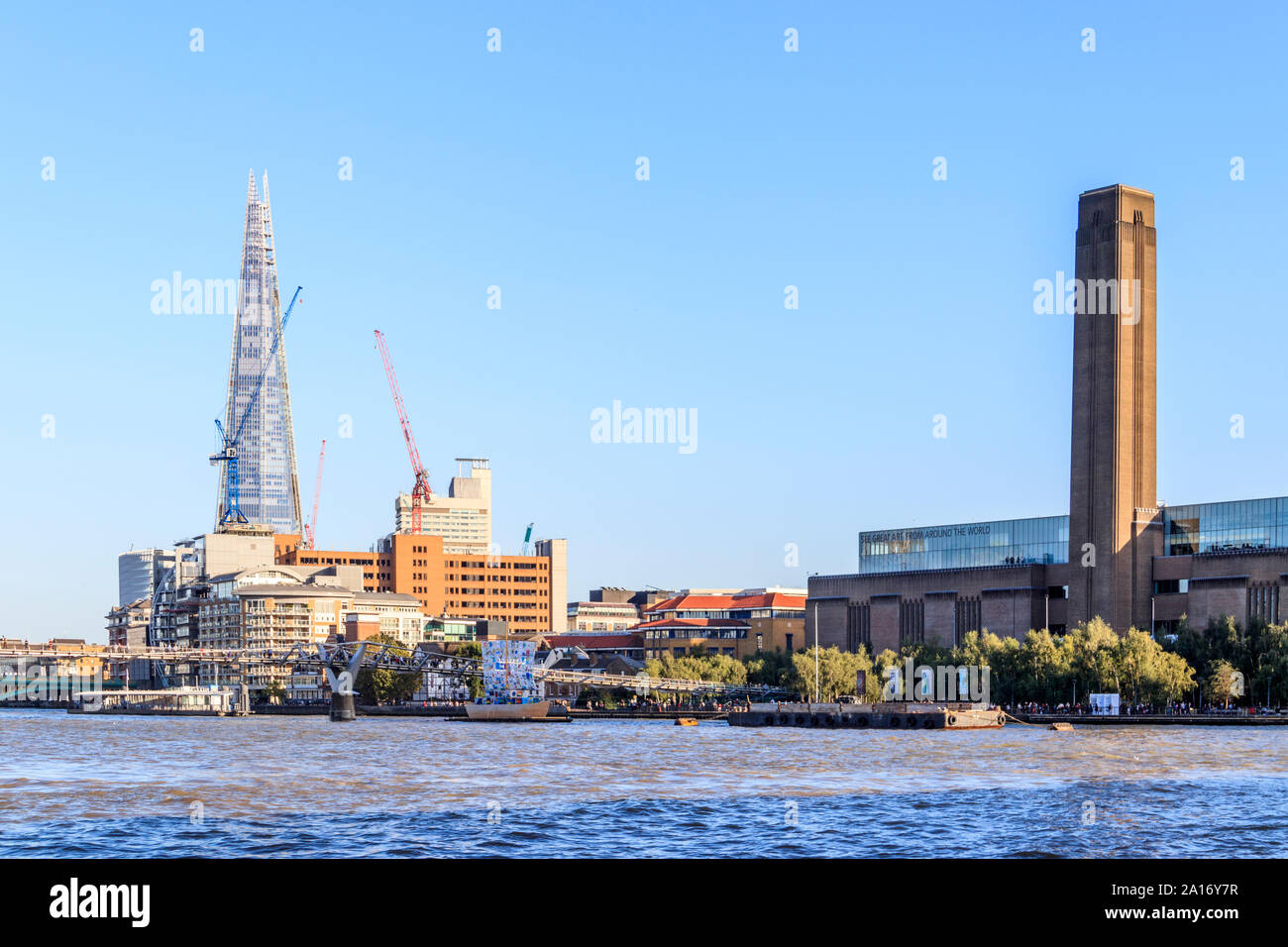 The Shard of Glass, Millennium Bridge and Tate Modern art Gallery from across the River Thames, London, UK Stock Photo