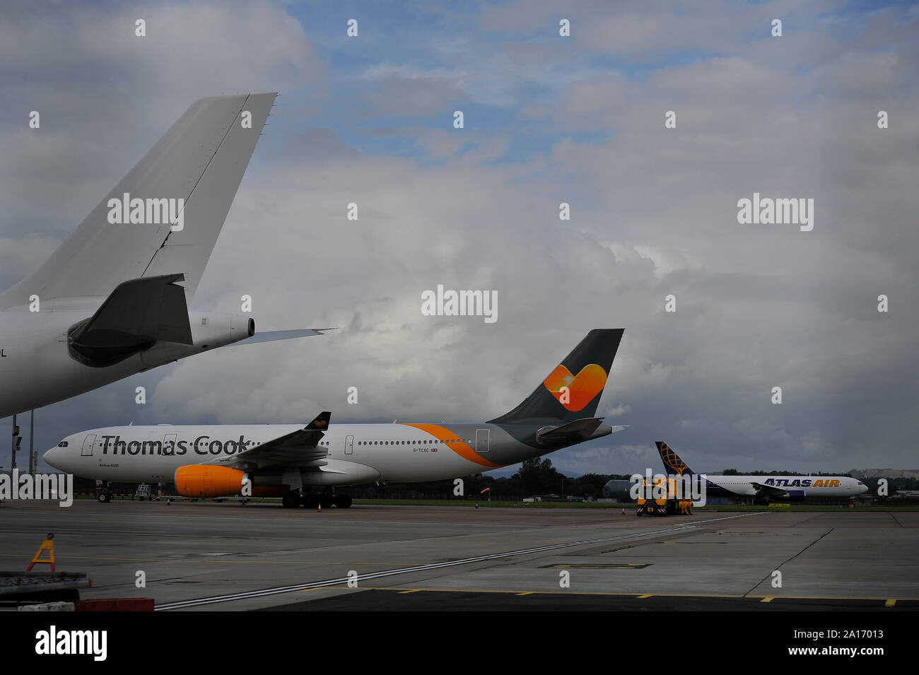 Glasgow, UK. 24 September 2019. PICTURED: An Airbus A330200 Aircraft stands empty and grounded on the tarmac at Glasgow International Airport.  Glasgow Airport Authority have placed 2 notices taped to the 2nd forward port side passenger door advising that the aircraft is grounded due to unpaid landing fees.  A huge snow plough stands underneath and behind the jet to prevent the aircraft from being pushed back from its position. Colin Fisher/Alamy Live News Credit: Colin Fisher/Alamy Live News Stock Photo