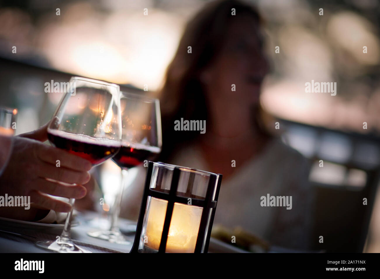 Two glasses of red wine on a restaurant table. Stock Photo