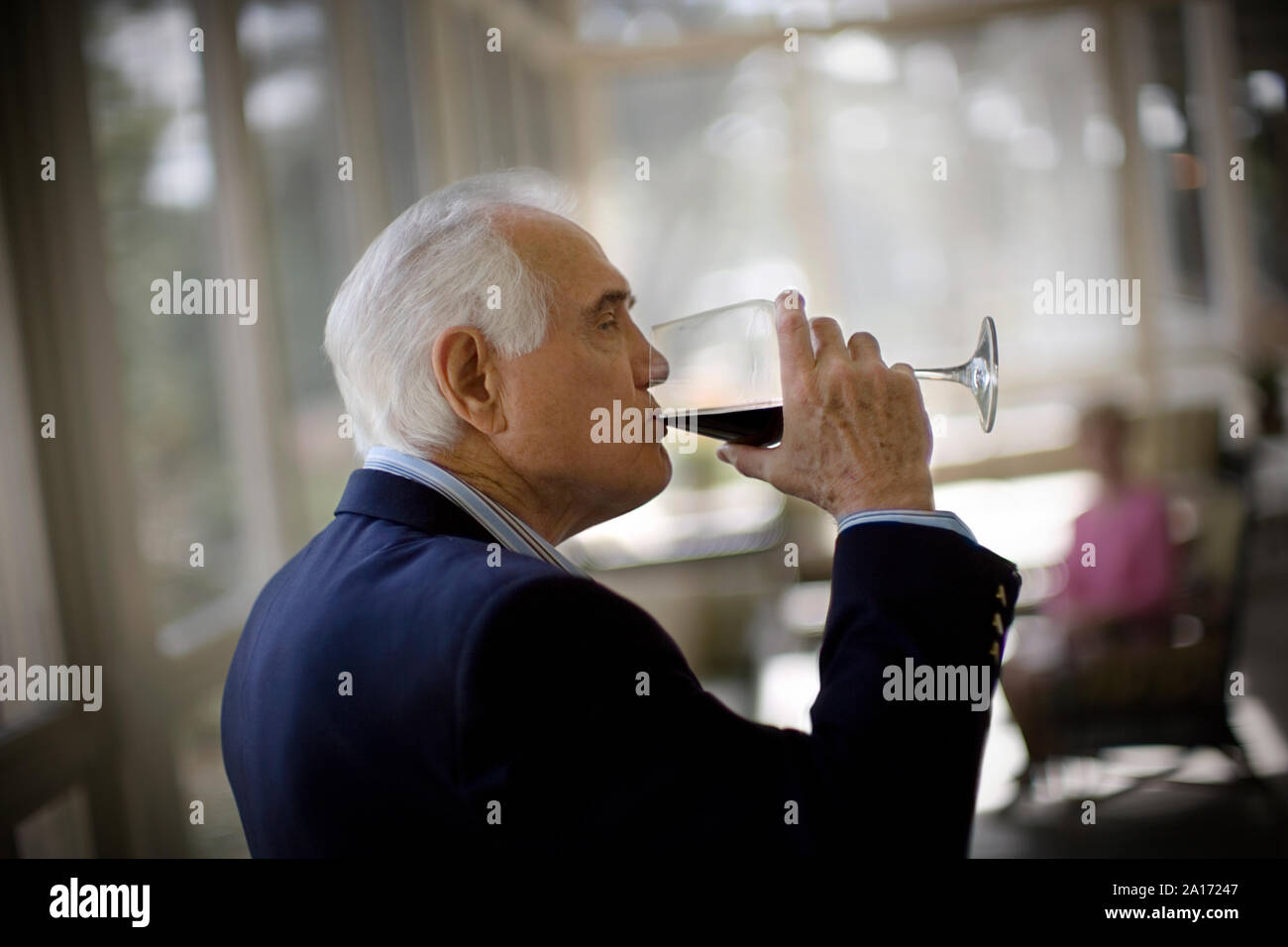 elderly man drinking  wine Stock Photo