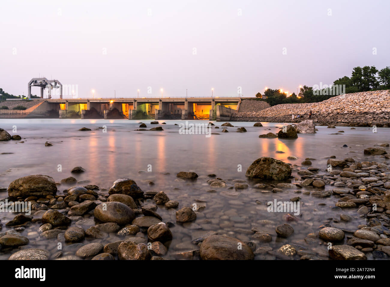 Gates of Indus River Tarbela Dam Ghazi at evening Stock Photo
