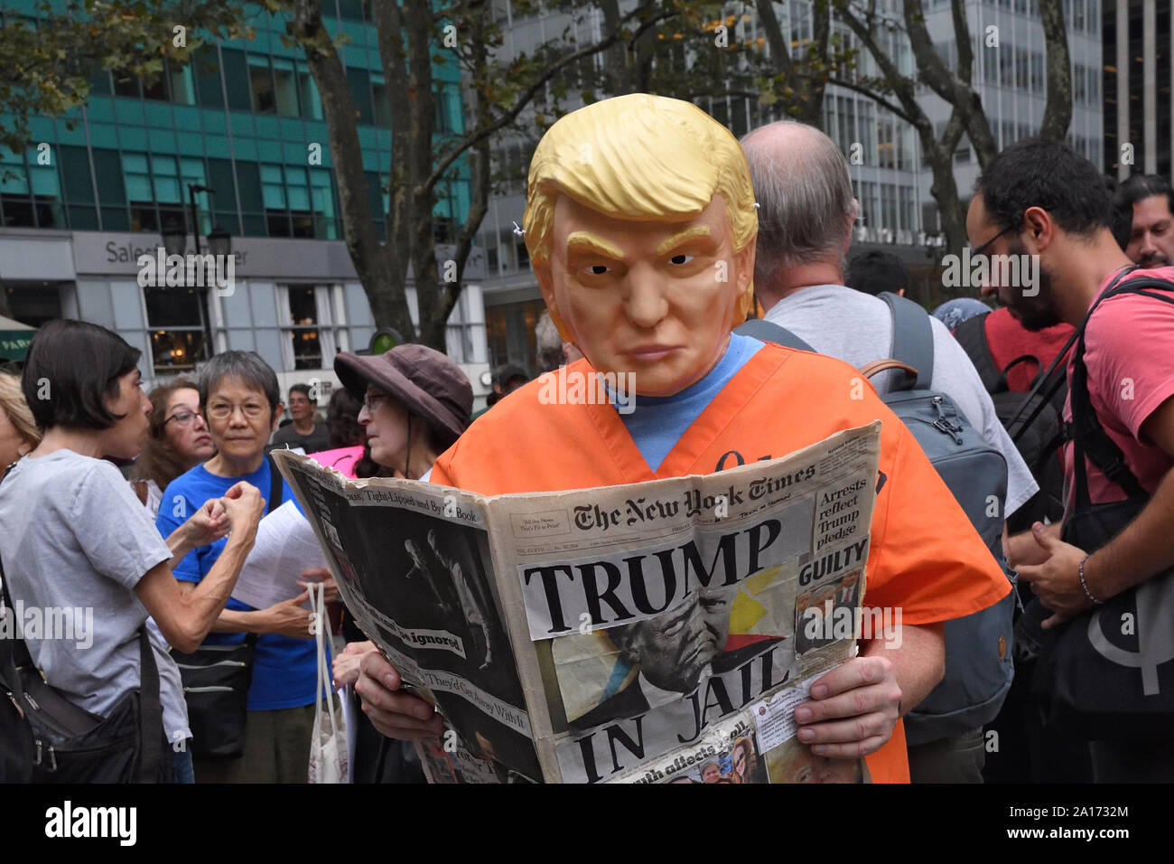 A Protester with a Trump mask during the Rise and Resist - United in Outrage, a Resistance March along Fifth Avenue. Stock Photo