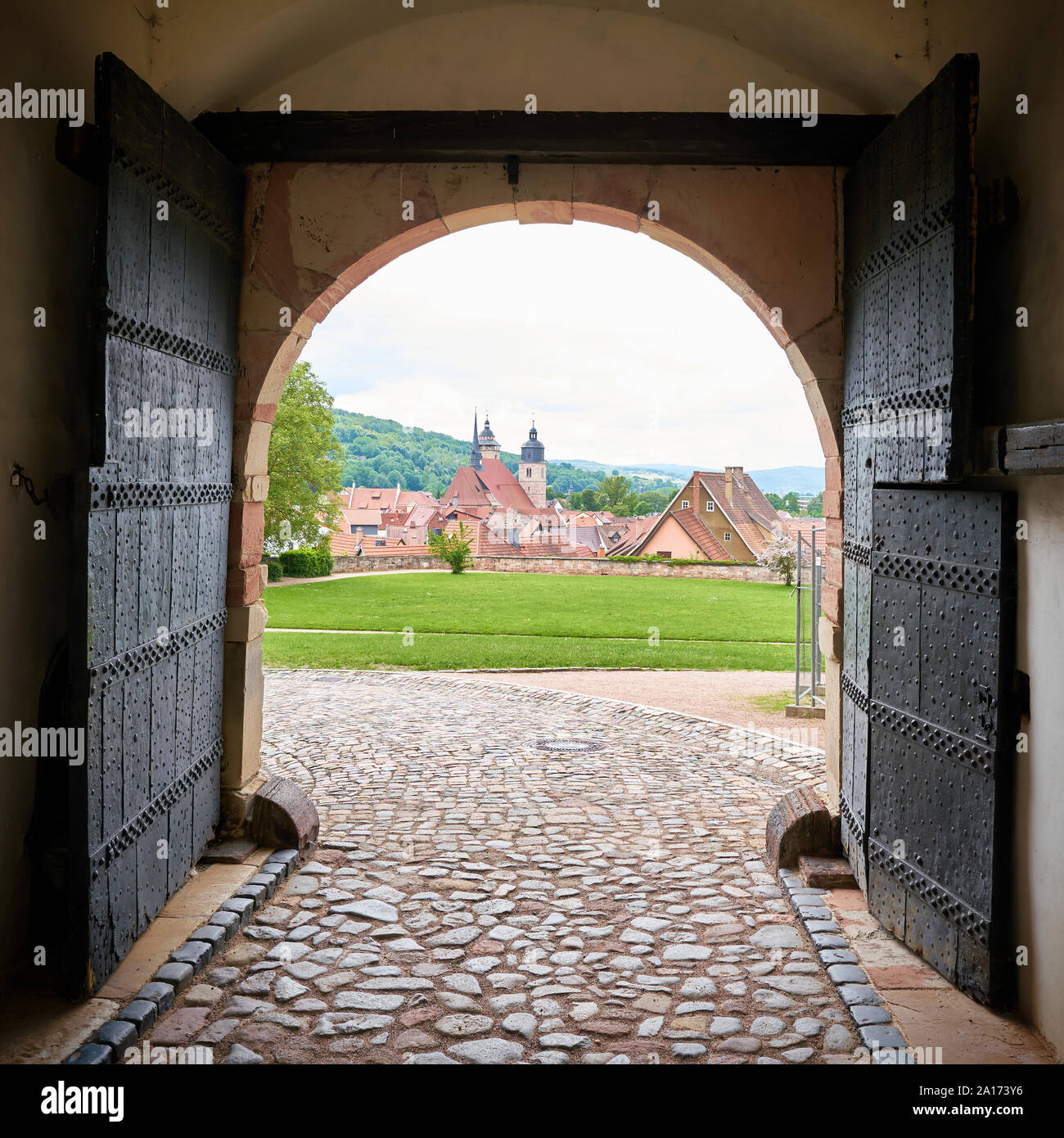 View through an archway of the castle Wilhelmsburg on the old town of Schmalkalden in Thuringia Stock Photo