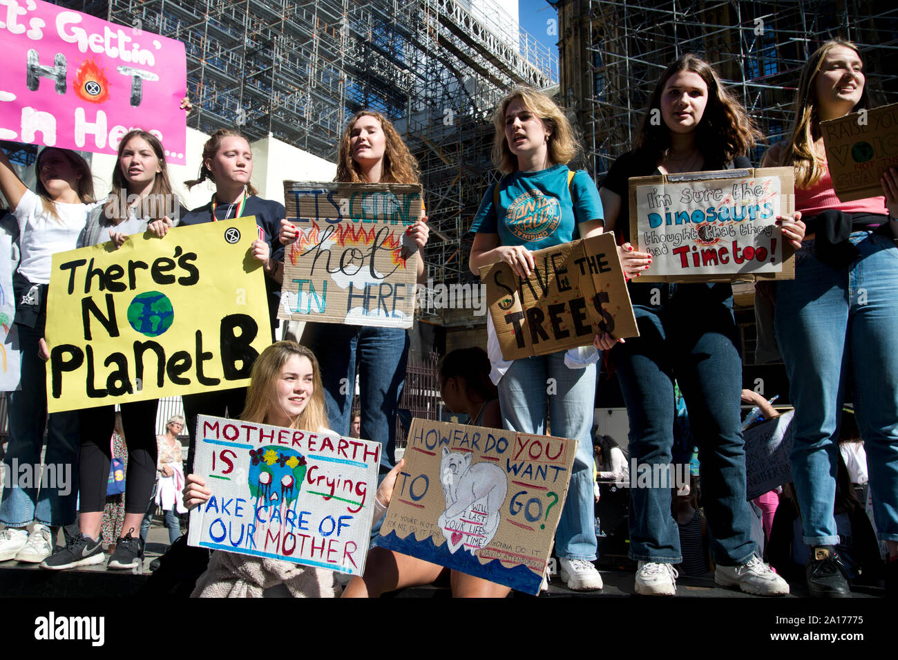 School students strike to create awareness of the climate catastrophe. A group of girls with placards in Whitehall Stock Photo