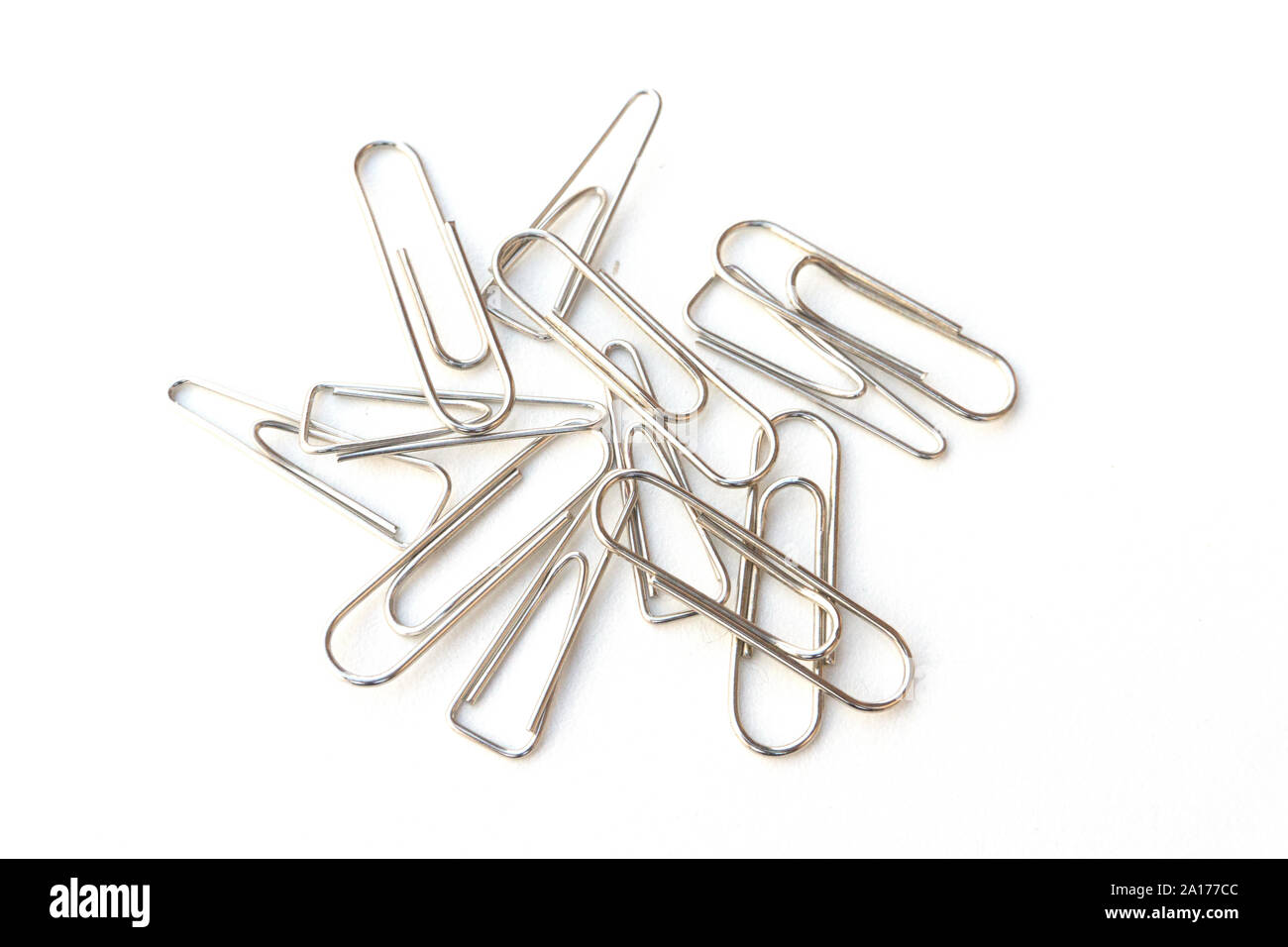 Paper clips on white background Stock Photo