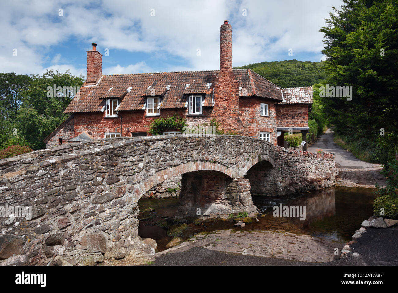 Bridge, ford and cottage at Allerford village. Exmoor National Park. Somerset. UK. Stock Photo