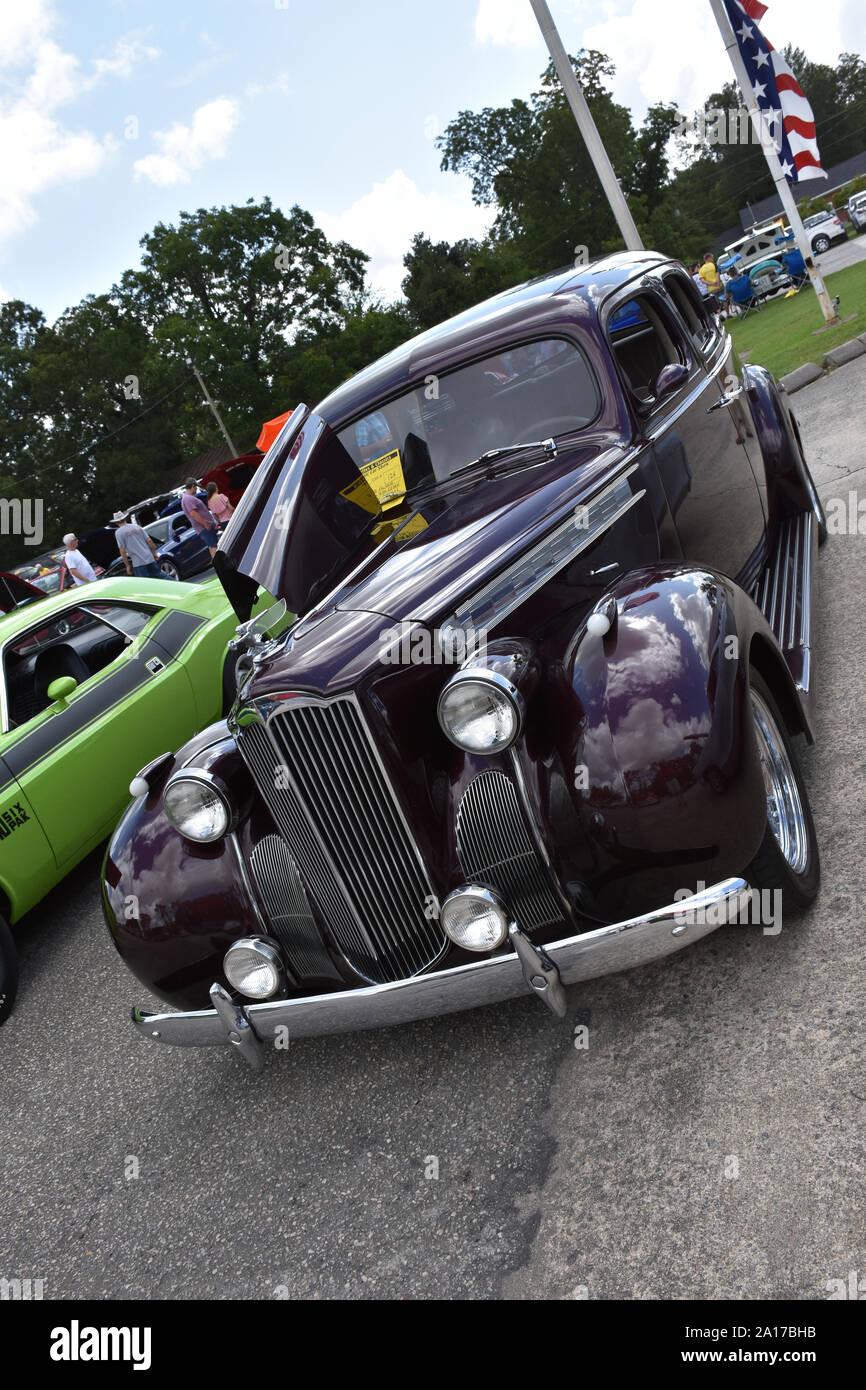 A 1940 Packard 4 Door Sedan on display at a car show. Stock Photo