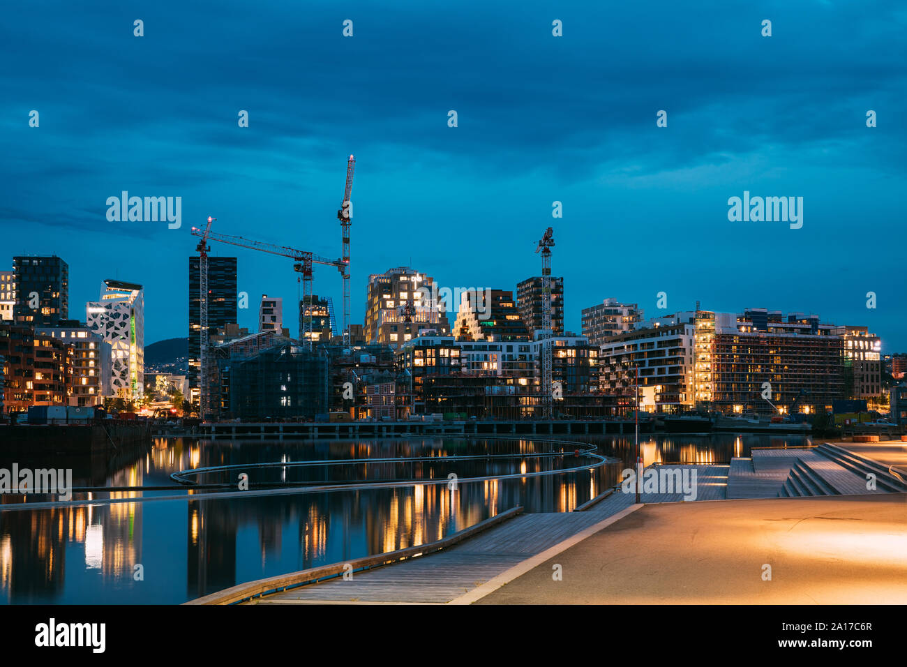 Oslo, Norway - June 25, 2019: Night View Embankment And Residential Multi-storey House On Sorengkaia Street In Gamle Oslo District. Summer Evening. Re Stock Photo