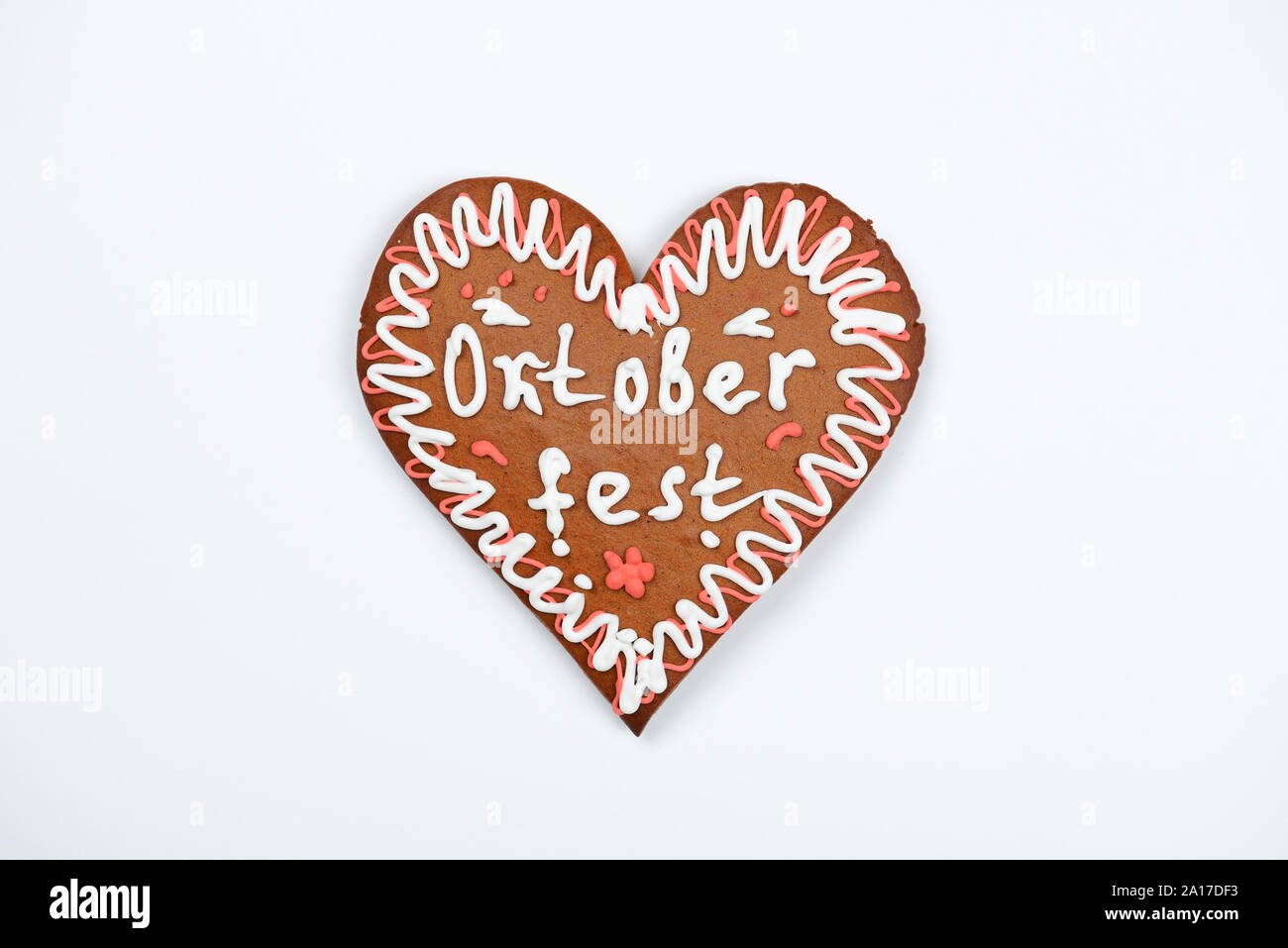 The gingerbread heart with Oktoberfest inscription on white background Stock Photo