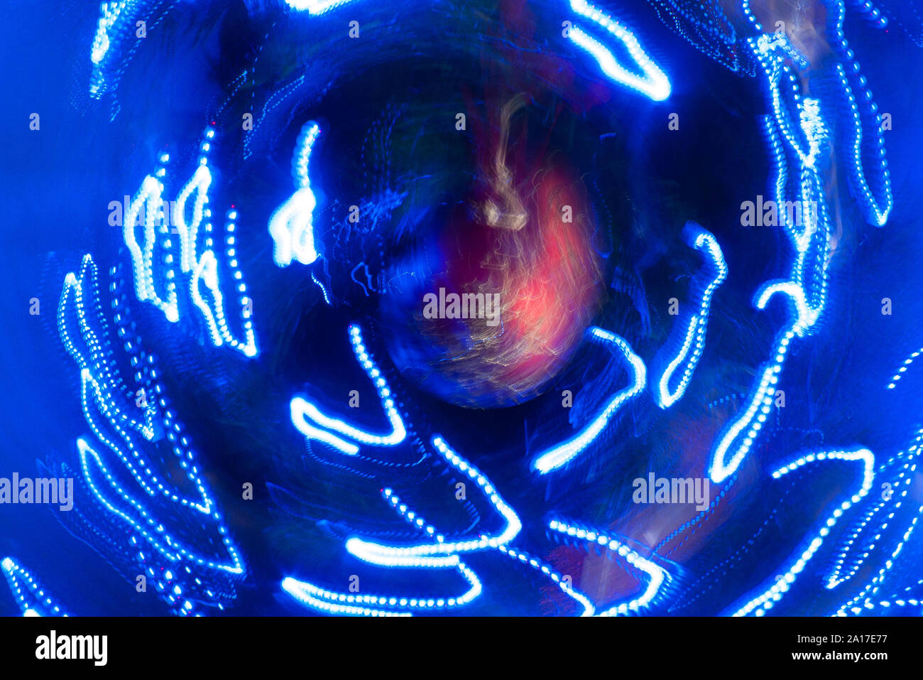 Intentional Camera Movement With Blue Fairy Lights Around A Christmas Bauble Stock Photo Alamy