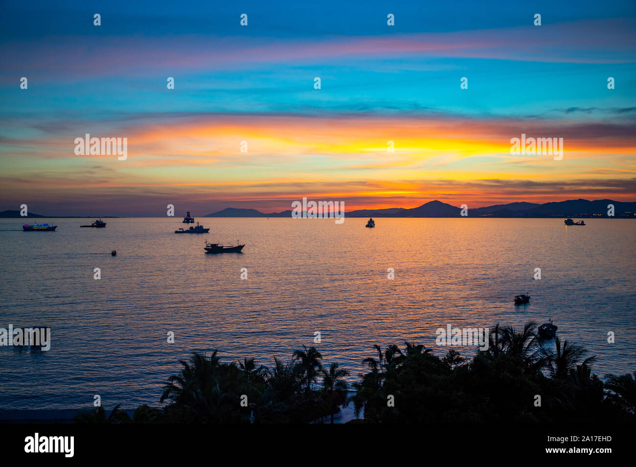 Fishing boats on sea at sunset hi-res stock photography and images - Alamy