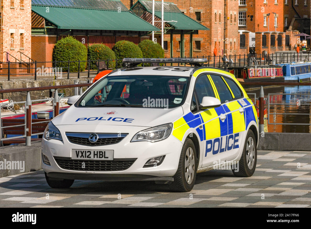 GLOCESTER, ENGLAND - SEPTEMBER 2019: Police patrol car parked in Gloucester Quays, which is the former docks area Stock Photo