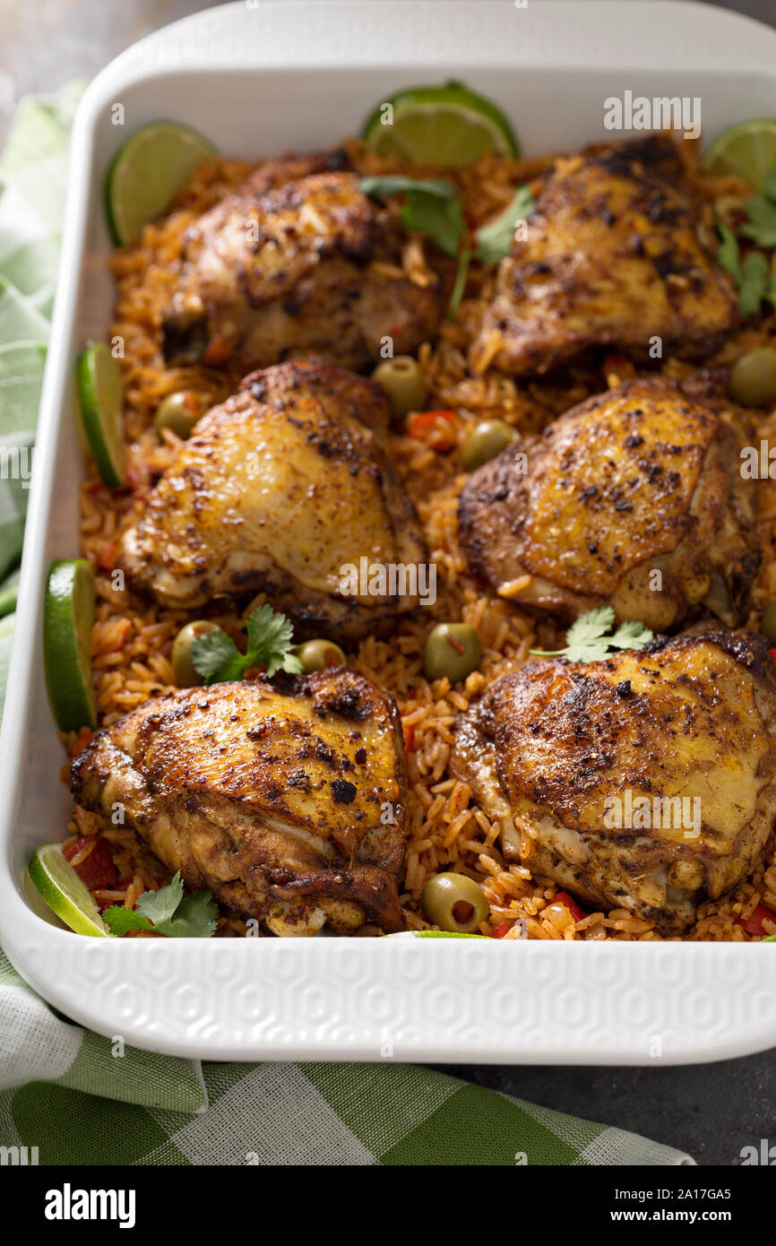 Arroz con pollo, roasted chicken with rice in a baking dish Stock Photo