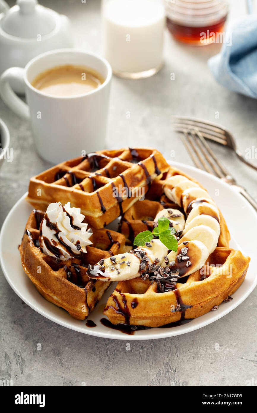 Breakfast waffles with bananas and chocolate sauce Stock Photo - Alamy