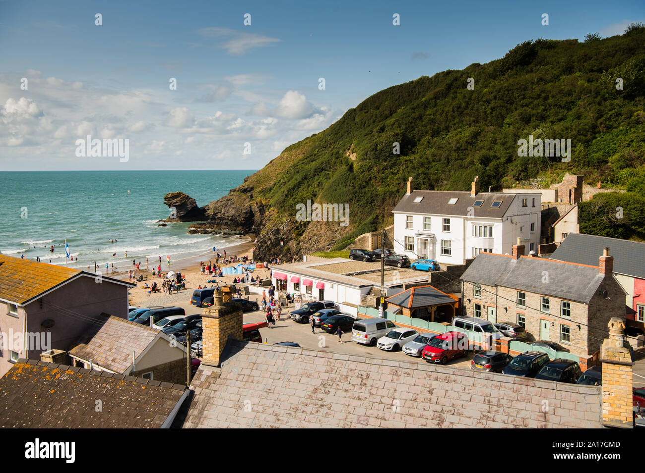 Llangrannog , a village and a community in Ceredigion, Wales, 6 miles southwest of New Quay. It lies in the narrow valley of the River Hawen, which falls as a waterfall near the middle of the village. Llangrannog is on the Wales Coast Path. Summer afternoon, August 2019 Stock Photo