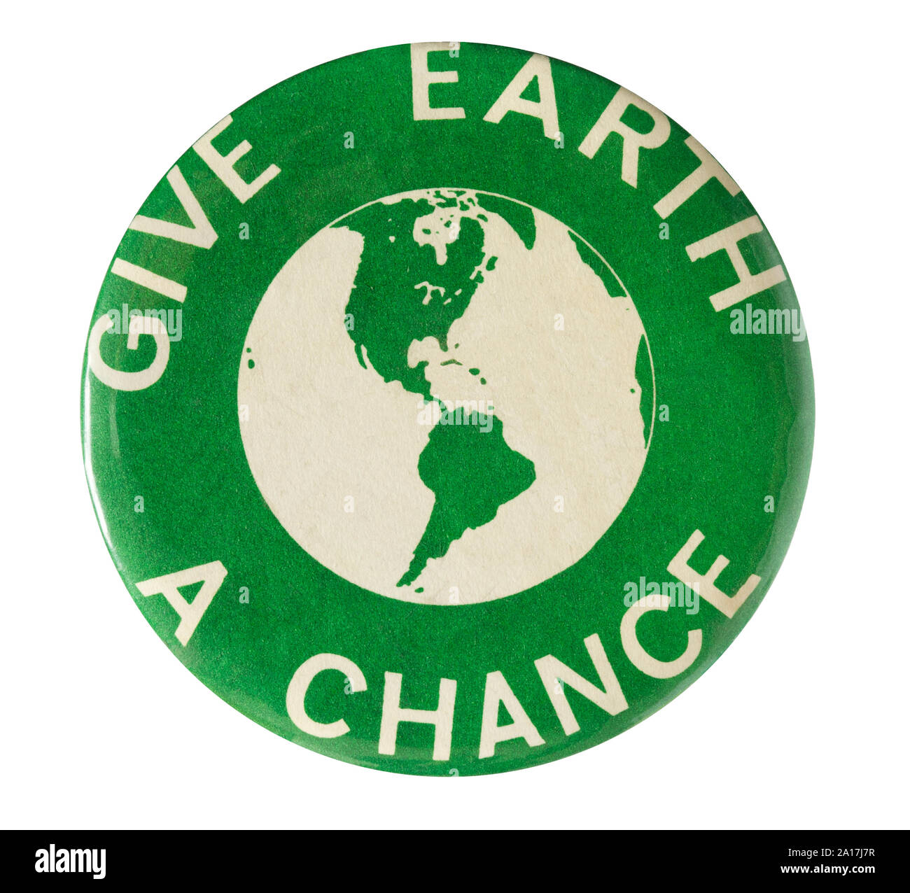 1970 Green Earth Day Button Pin showing the continents of North America and South America with the slogan Give Earth A Chance Stock Photo