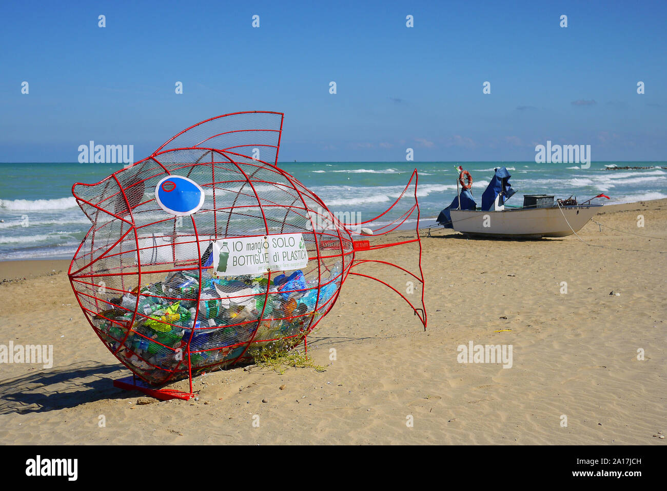 Plastic bottle recycling fish on the Adriatic coast at Termini, Casalbordino, Italy. It reads 'I only eat plastic bottles'. Stock Photo