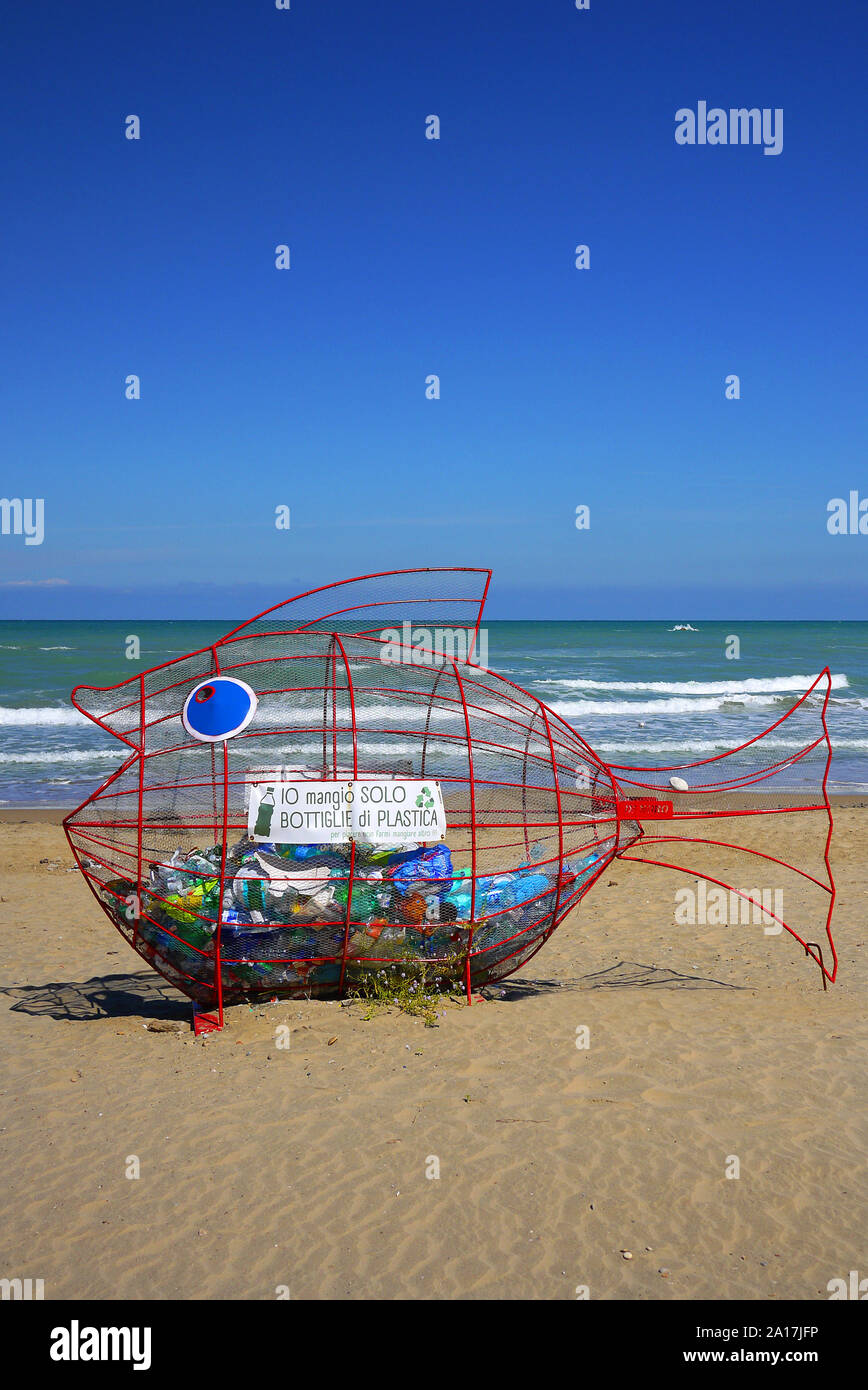 Plastic bottle recycling fish on the Adriatic coast at Termini, Casalbordino, Italy. It reads 'I only eat plastic bottles'. Stock Photo
