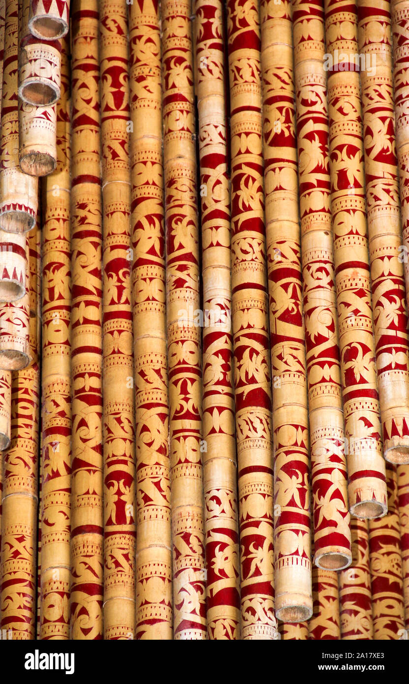 Painted bamboo poles in Sarawak Bornero South East Asia Stock Photo - Alamy