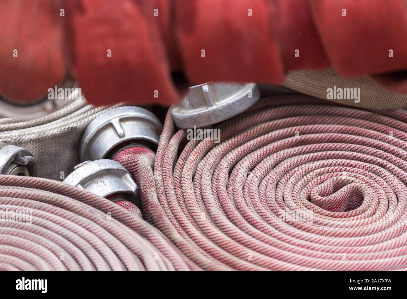fire hoses background Stock Photo - Alamy