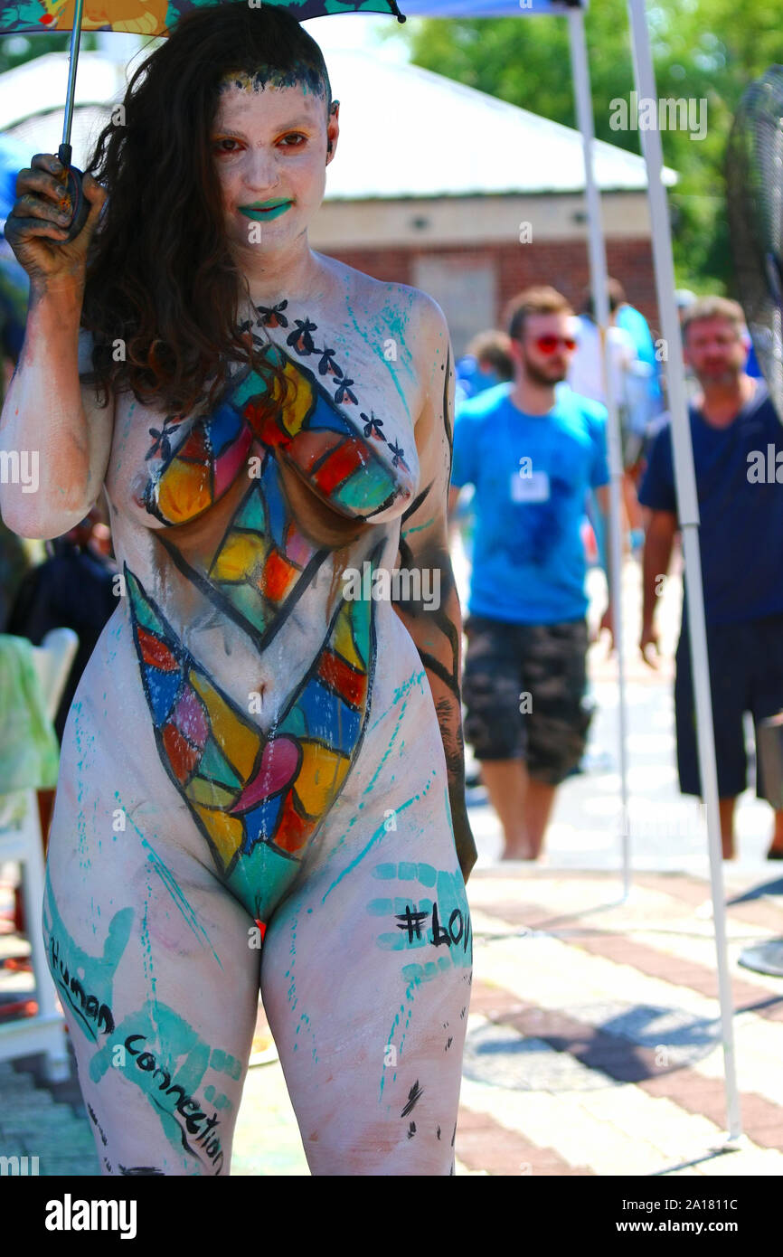 Models are being body painted during annual Andy Golub's NYC