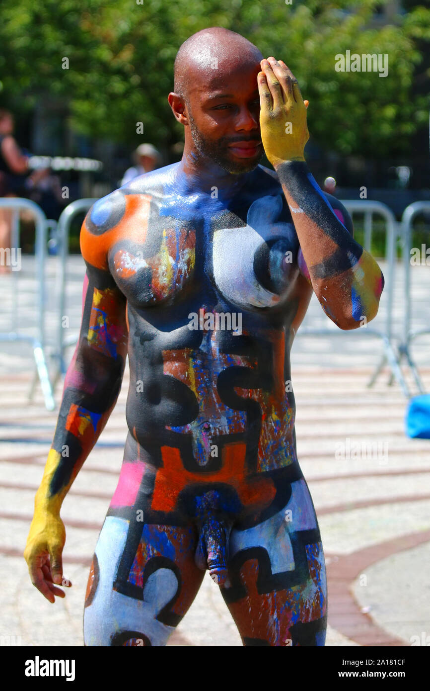 Models are being body painted during annual Andy Golub's NYC