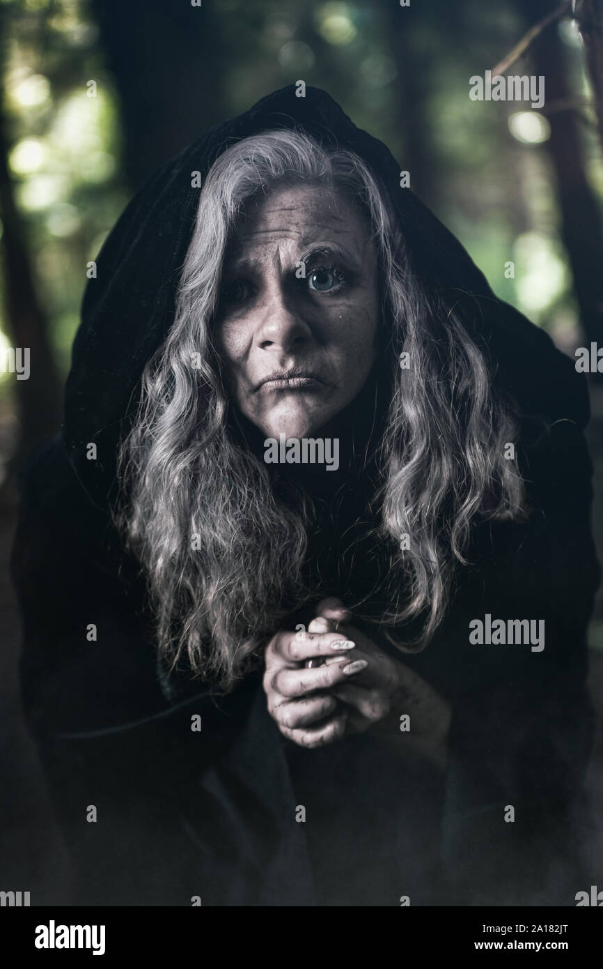 Old Hag in the woods Stock Photo