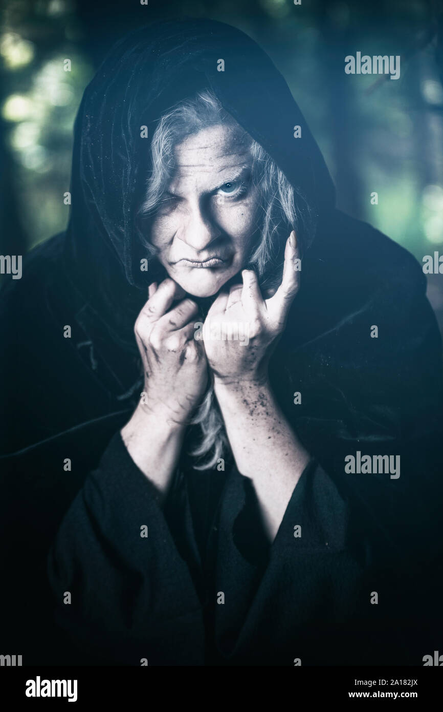 Old Hag in the woods Stock Photo