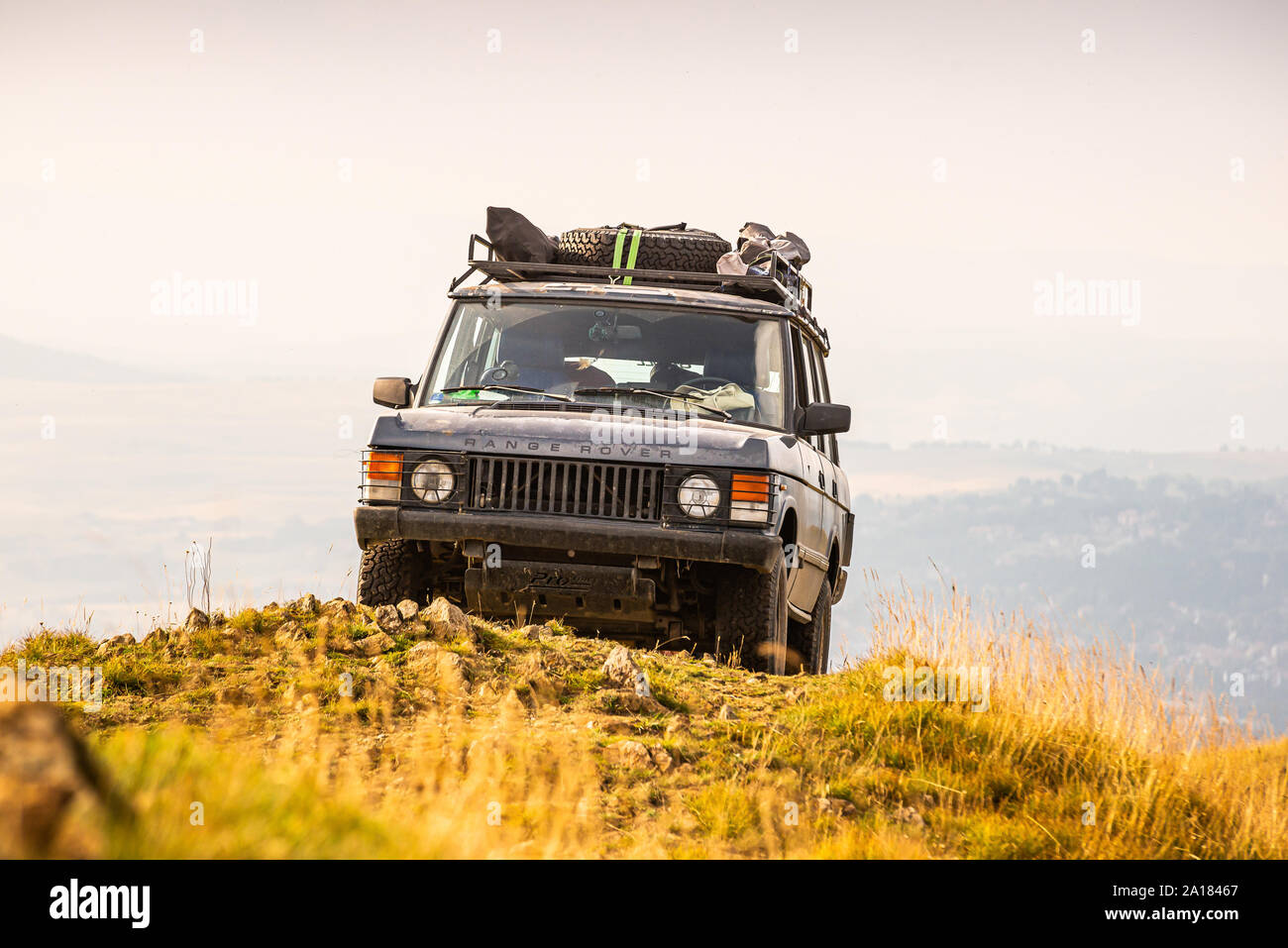 Zlatibor, Serbia - July 30, 2019. Vintage off road car on the top of the golden hill Stock Photo