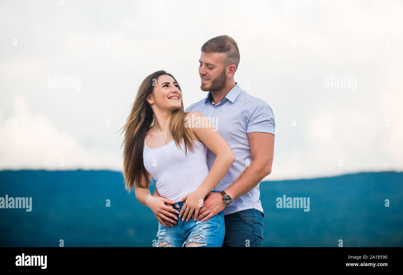 Couple goals concept. Love story. Romantic relations. Cute and sweet  relationship. Couple in love. Man and woman cuddle nature background.  Family love. Devotion and trust. Together forever we two Stock Photo 