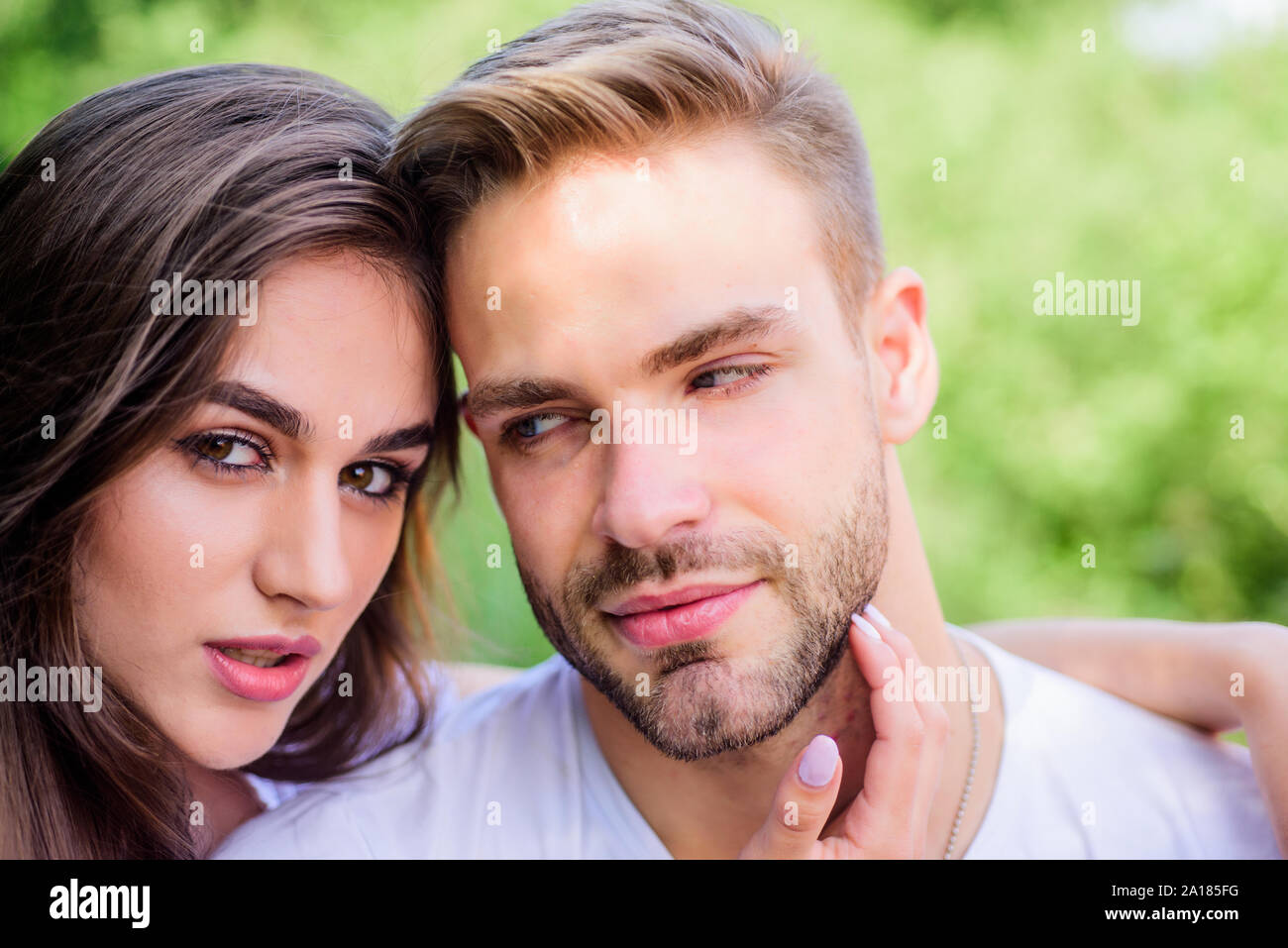 couple in love. Skin and hair care. couple relax outdoor. Tender feeling.  family weekend. romantic date. girl with guy in park. Beauty and fashion.  Love is more than just a game for