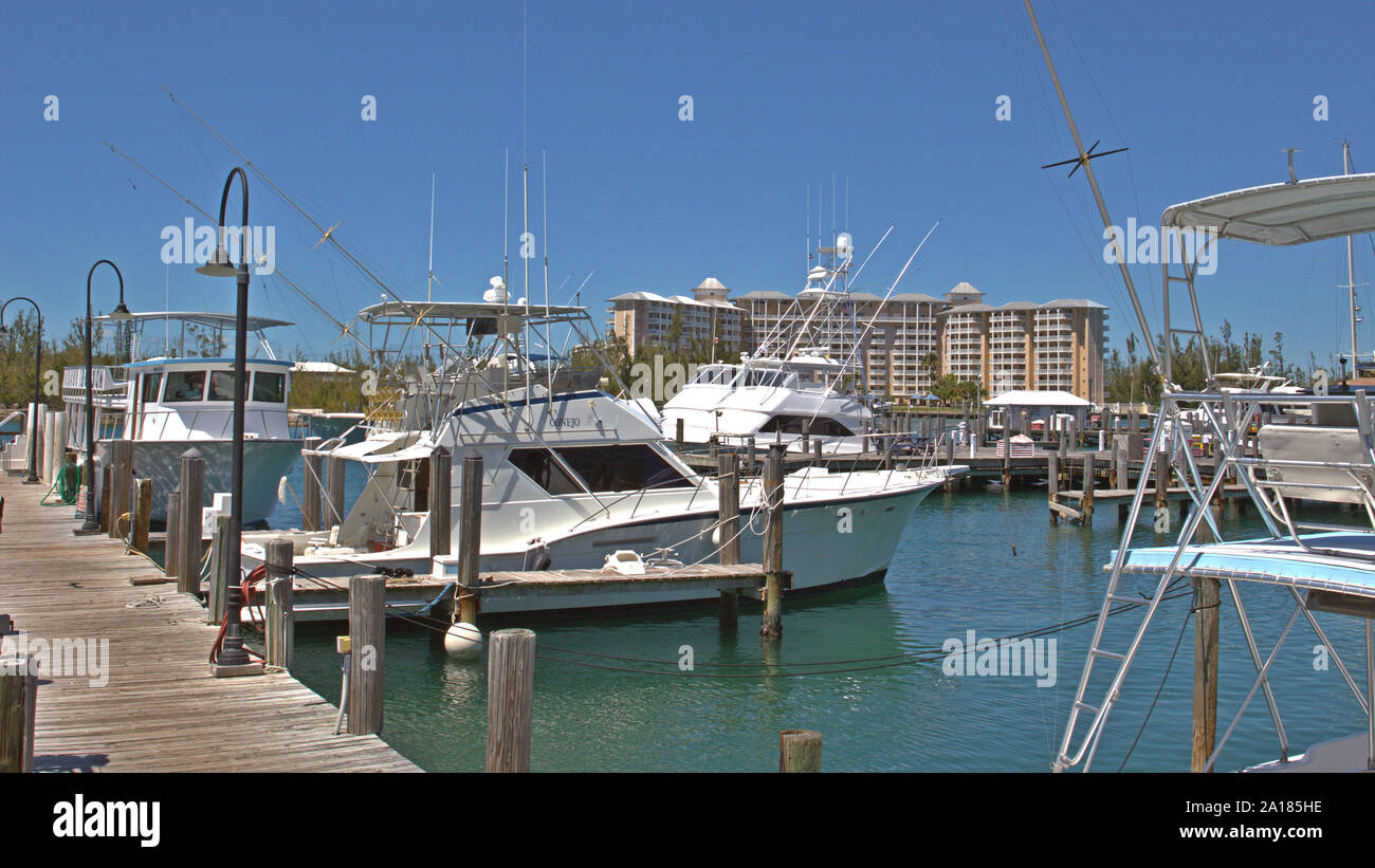 Port Lucaya on Grand Bahama Island. Many of the boats are for charter, especially for fishermen. Others are used for scuba diving. Stock Photo