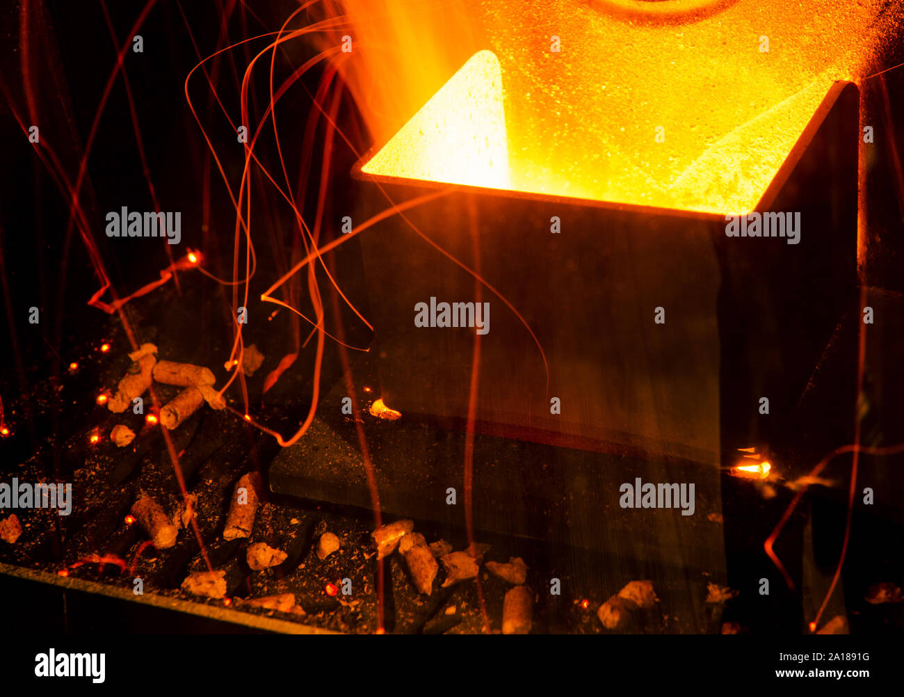 closeup on the combustion of an pellet stove Stock Photo