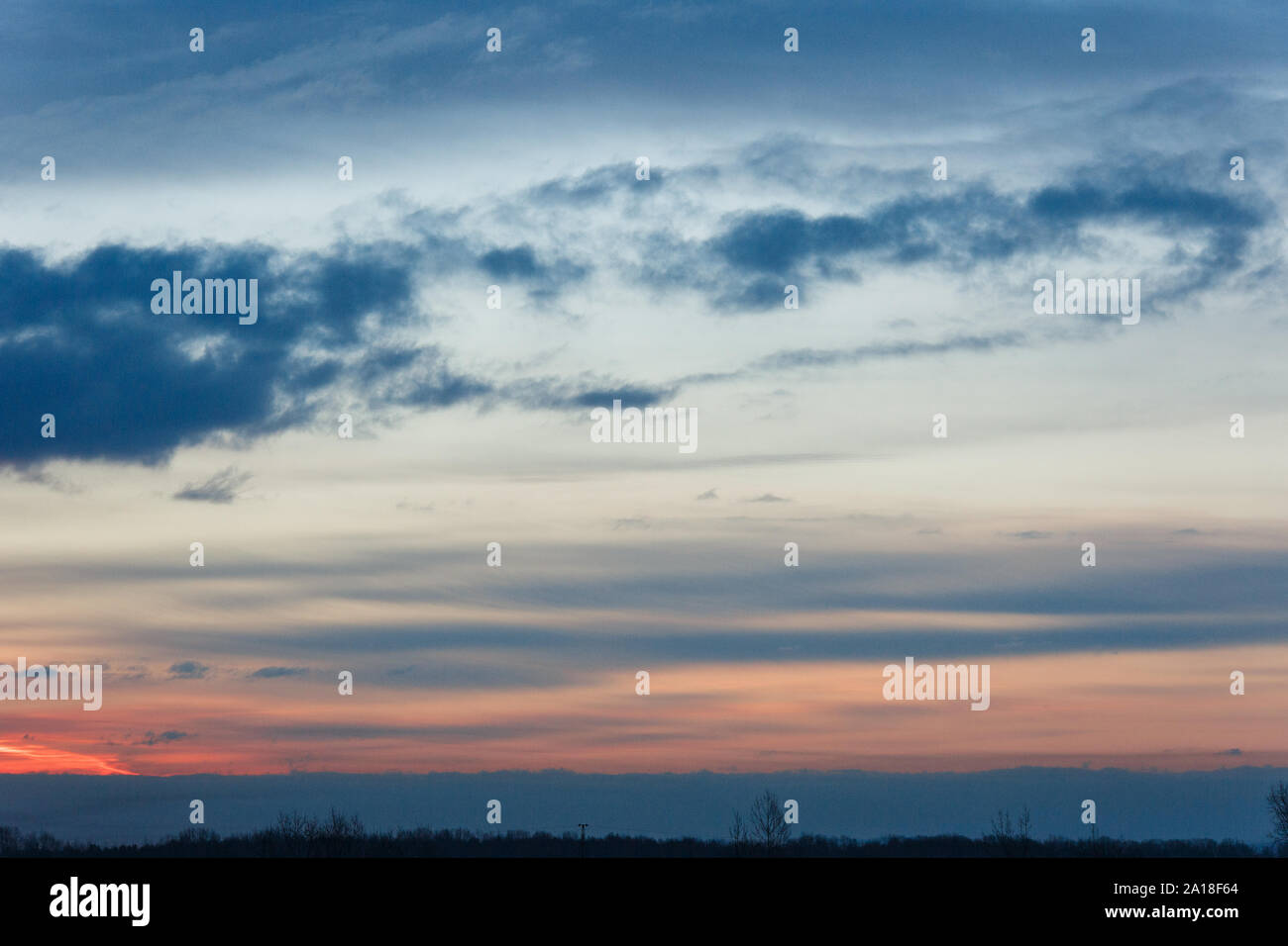 colorful dramatic sky with cloud at sunset Stock Photo