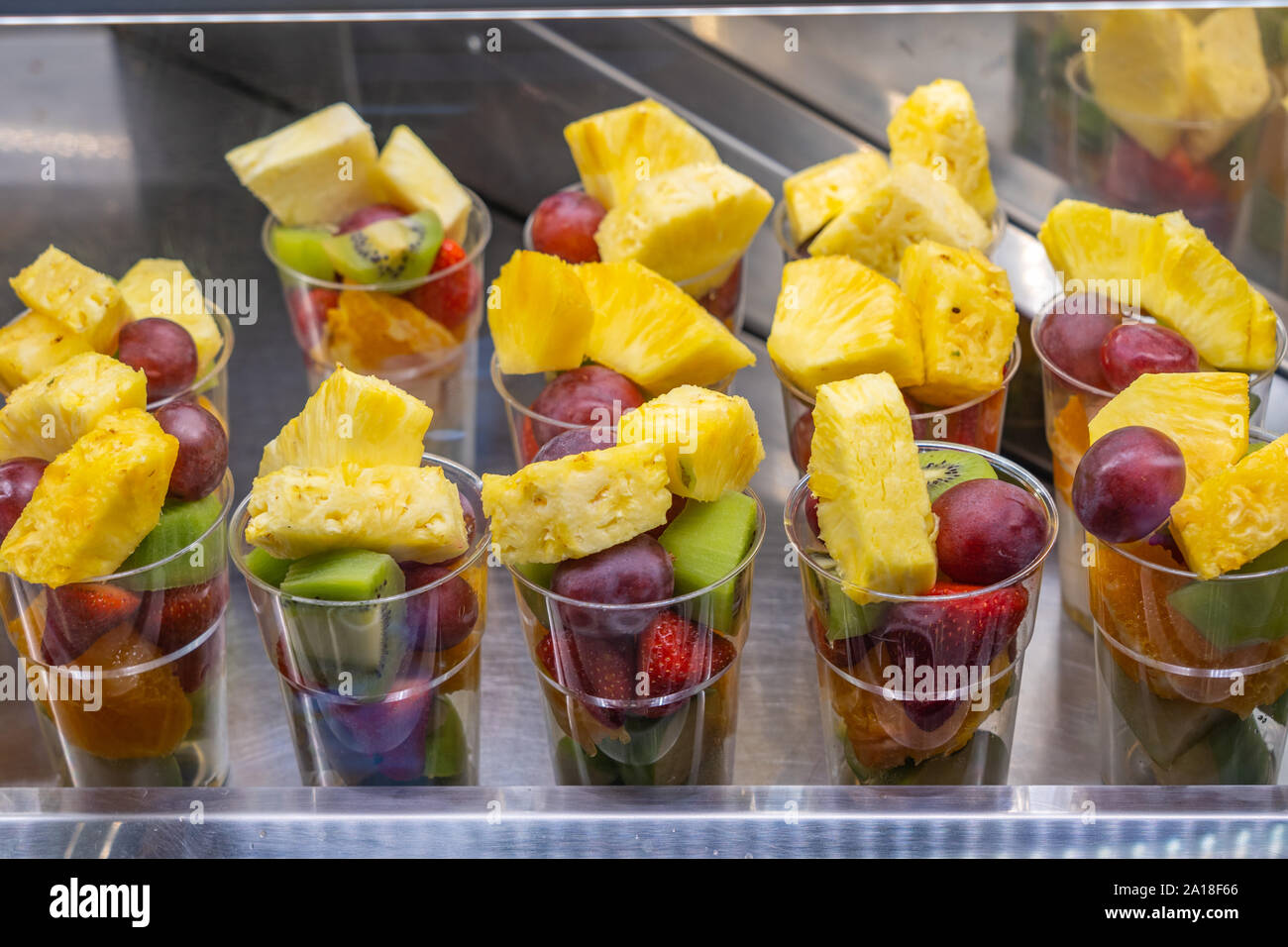 Fresh and delicious fruit cup for sale at dessert store Stock Photo Alamy